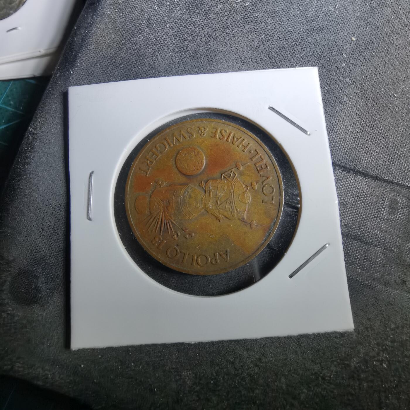 沼泽如烟--第950场 阿波罗纪念章