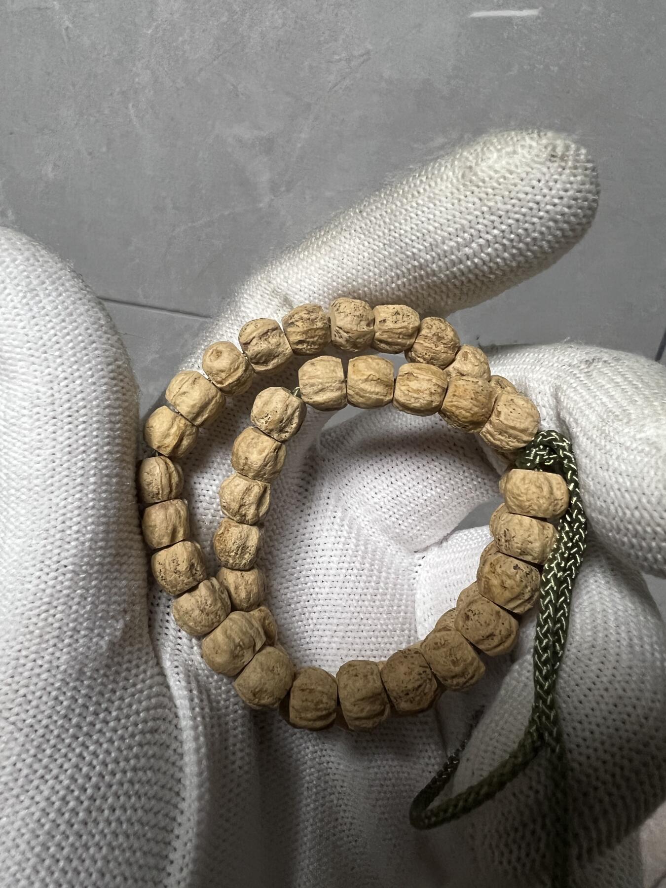 零元拍：百香籽 手持 手串 7/5MM左右