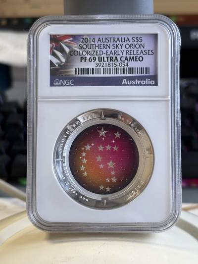 第186期拍卖 - 澳大利亚2014年南天星空系列3猎户座凹凸纪念1盎司彩色银币NGC-PF69，999银，发行10000枚