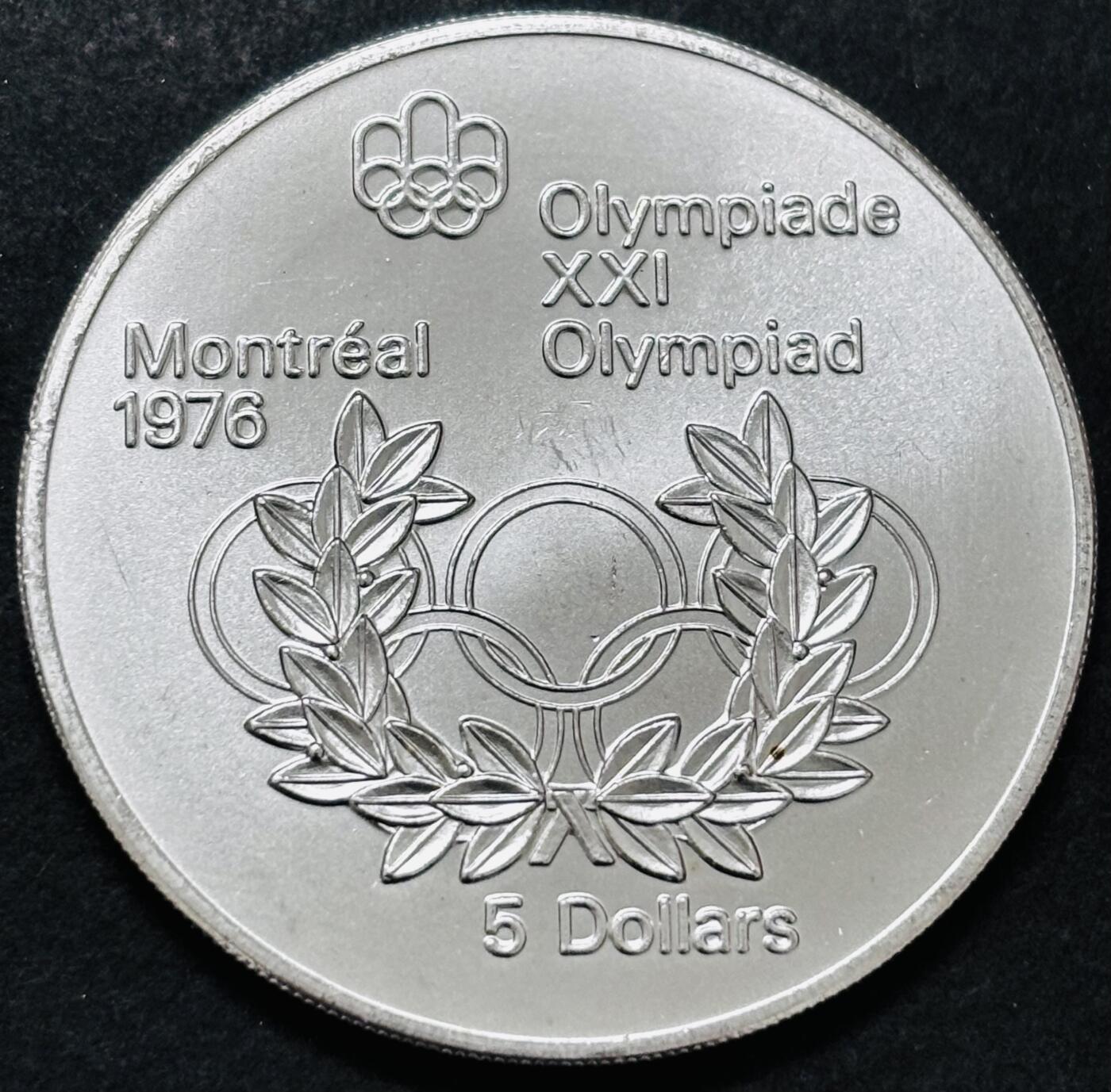 文馨钱币收藏 迎新纳福2026新年第一场（第 287 场）金银老铜币拍卖 原光品相 1974 年加拿大蒙特利亚第 21 届夏季奥林匹克运动会吊环系列赛 5 元纪念大银币，24.3 克 925 高银，品相可评级