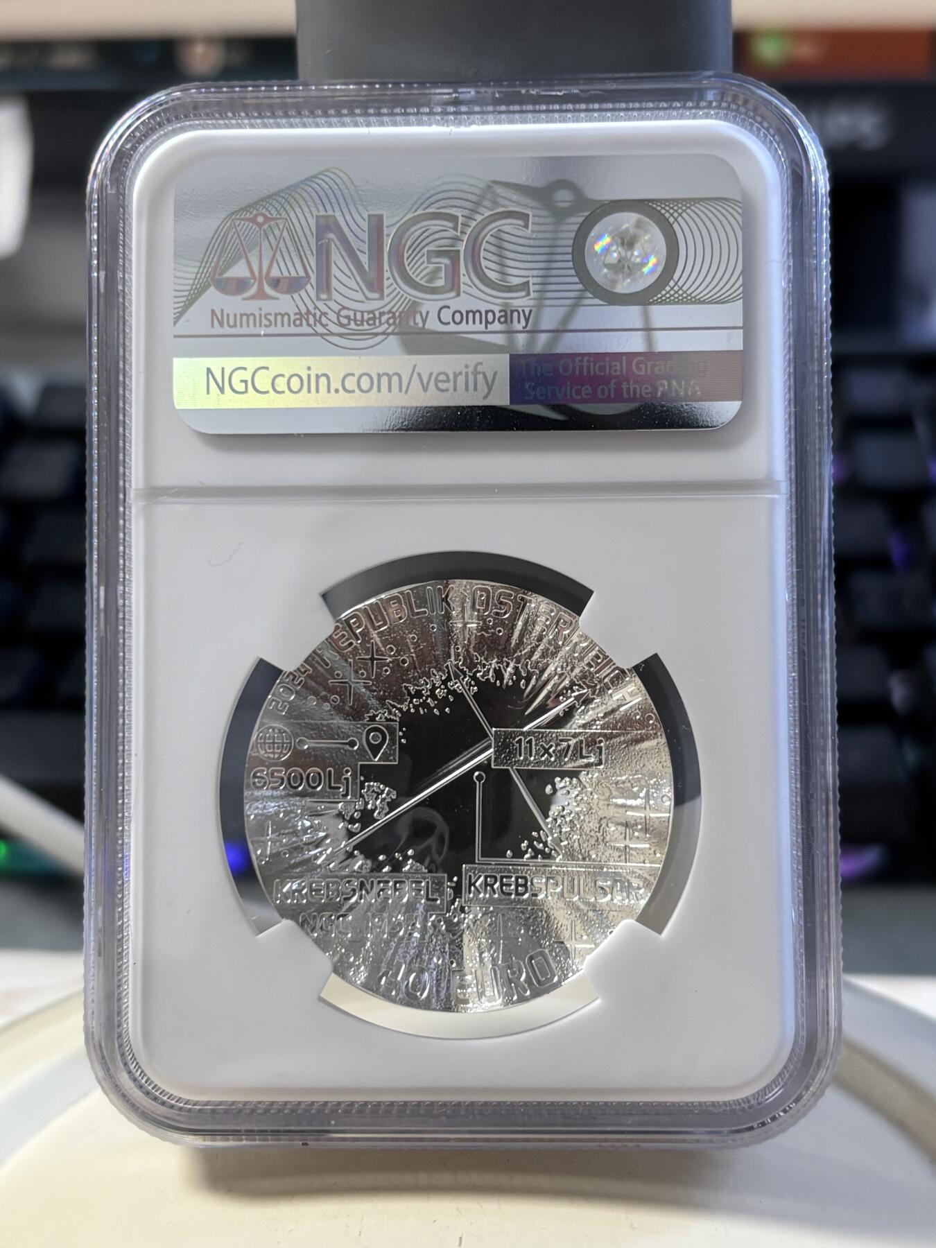 第186期拍卖 获奖币奥地利2024年宇宙之美系列超新星凹凸面22.42克彩色纪念银币NGC-PF69，925银，发行30000枚