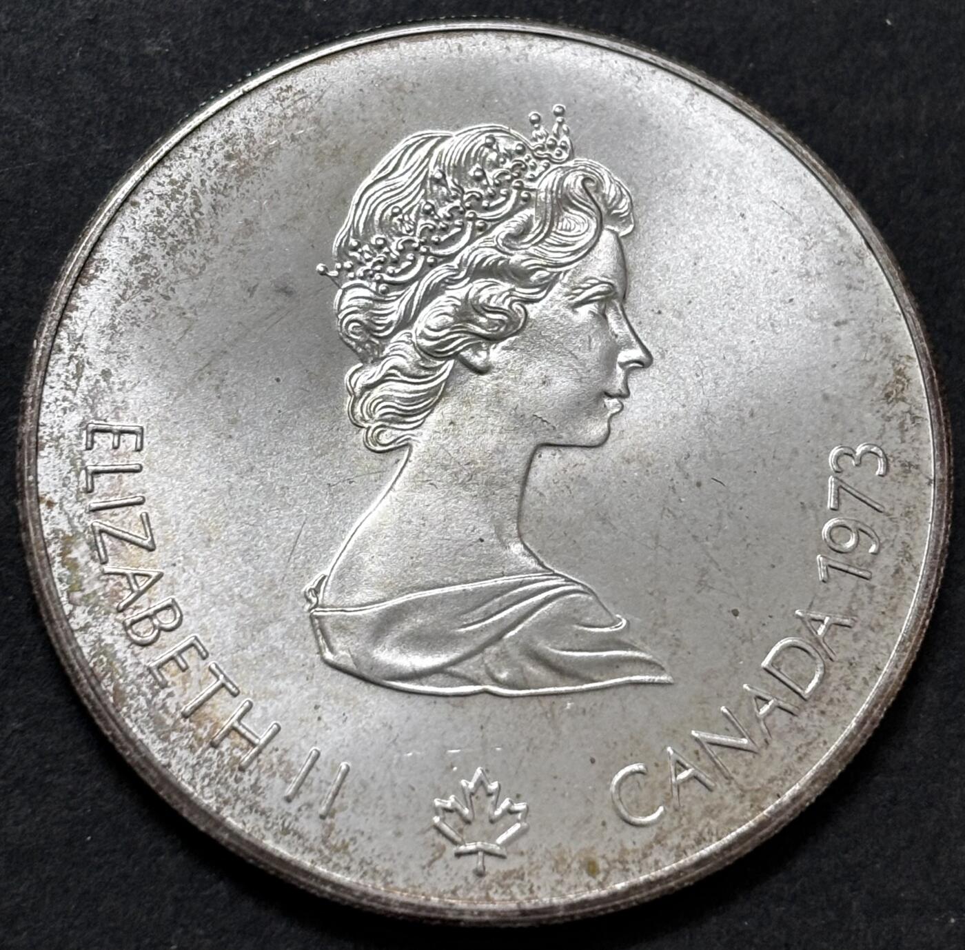 文馨钱币收藏 迎新纳福2026新年第一场（第 287 场）金银老铜币拍卖 原光品相 1973 年加拿大蒙特利尔第 21 届夏季奥林匹克运动会帆船系列 5 元纪念大银币，24.3 克 925 高银，金黄彩边，品相可评级