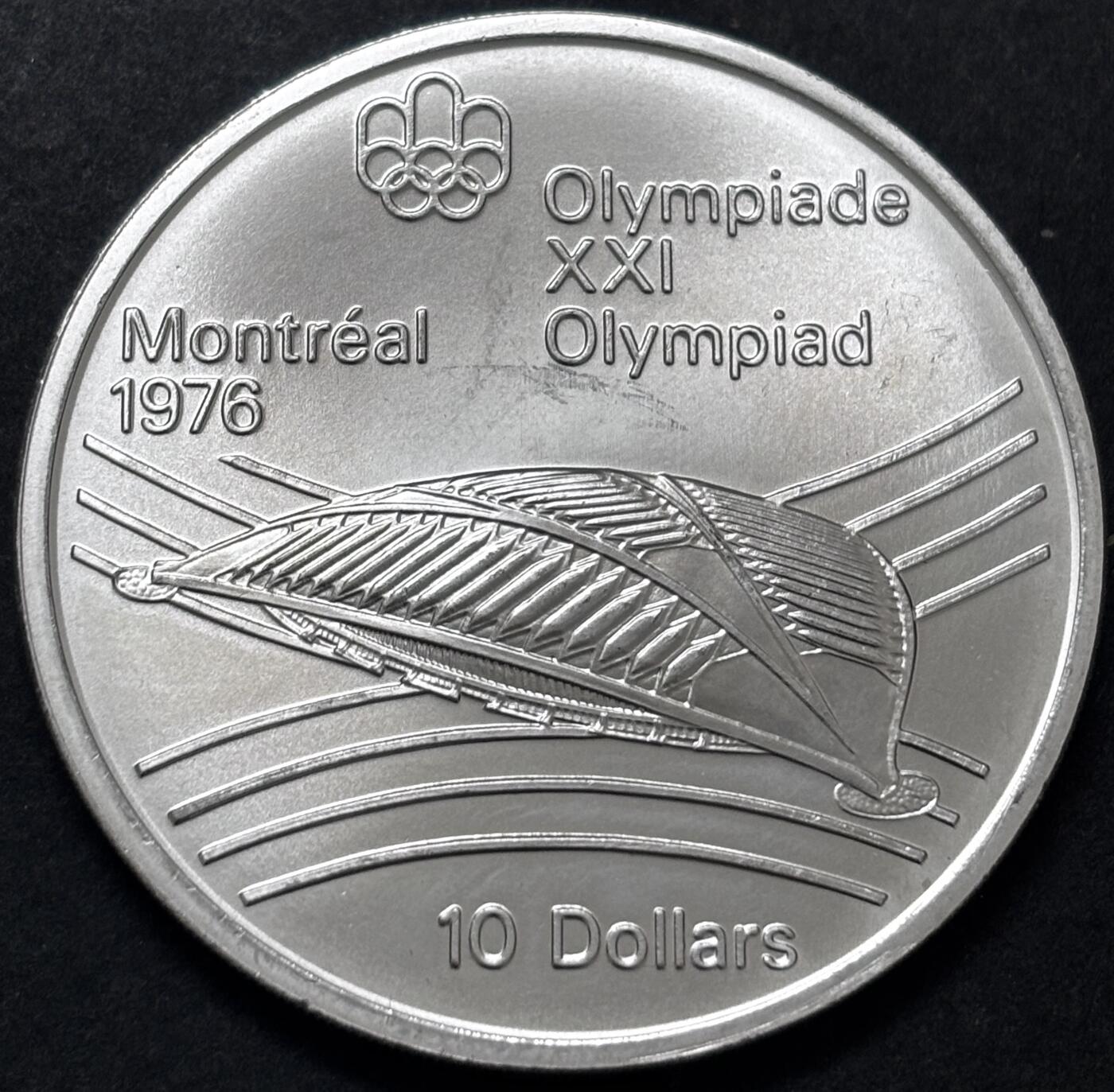 文馨钱币收藏 迎新纳福2026新年第一场（第 287 场）金银老铜币拍卖 原光品相 1976 年加拿大蒙特利尔第 21 届夏季奥林匹克运动会赛车场系列 10 元大型纪念银币 48.6 克 925 高银，品相可评级