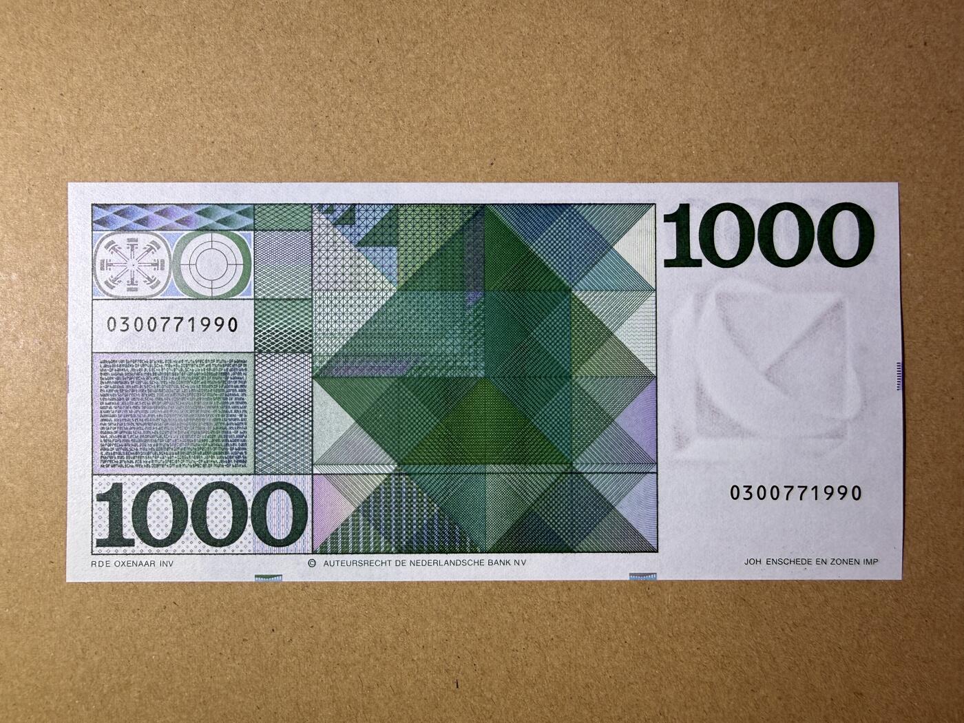 《艾美收藏》第227期-1.3周六外币黄金场-马年首拍 荷兰1000盾 AU 人像版斯宾诺莎 中间有道不明显的暗折(肉眼几乎不可见) 无4 汇率近4000元