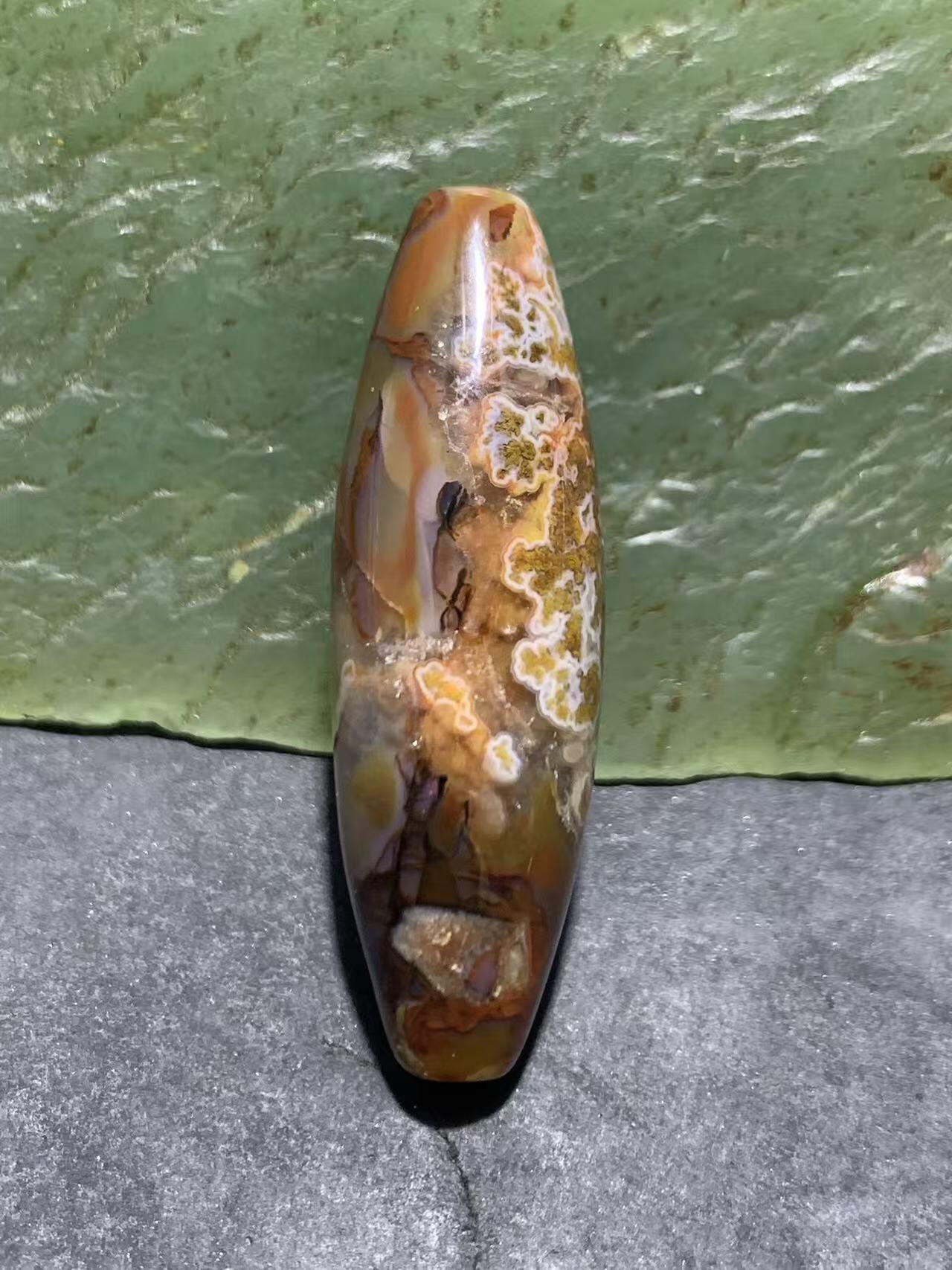 冻料草花纹战国红玛瑙天珠形通货桶珠一个