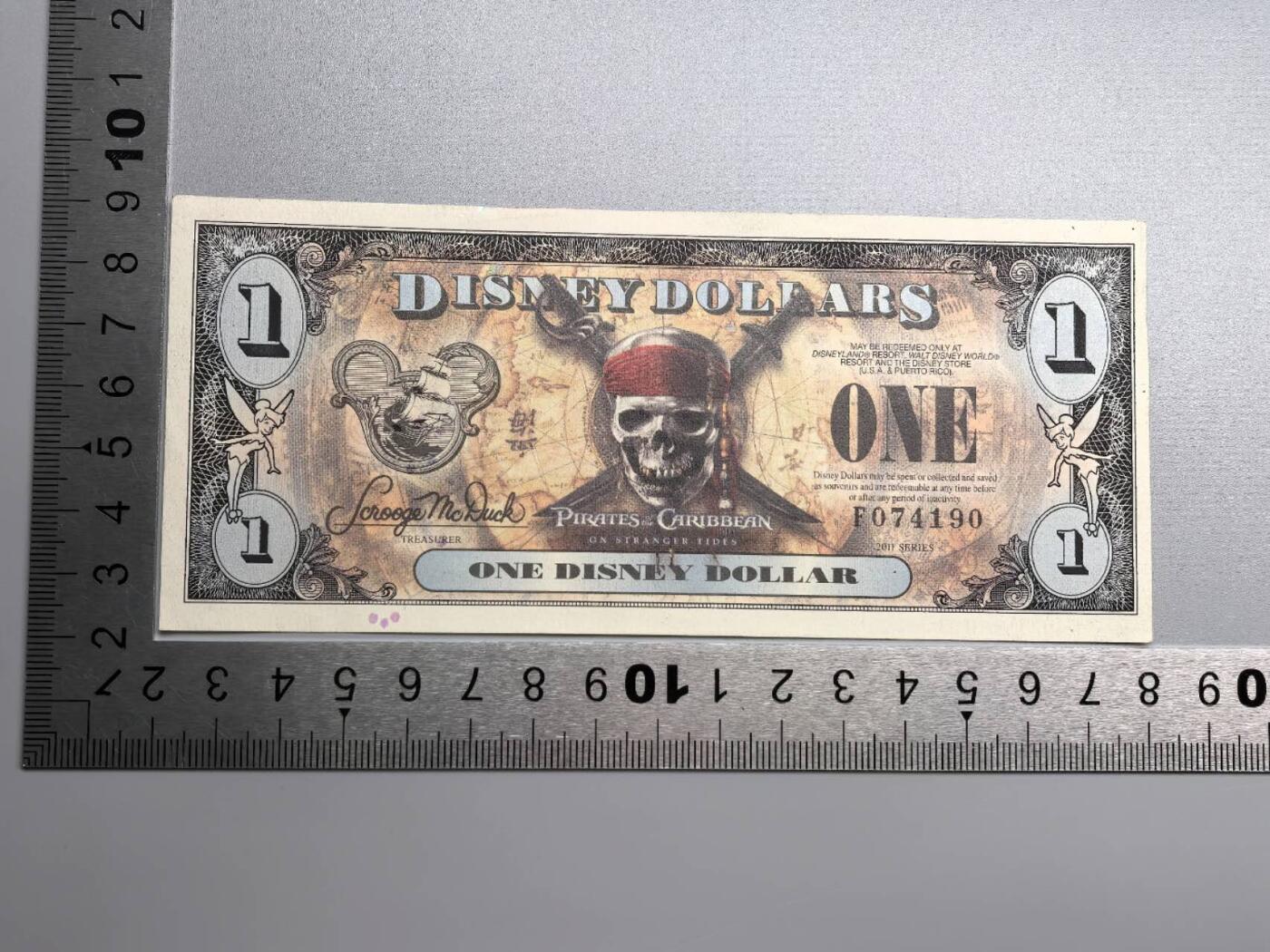 小驴勋章奖章收藏1月2日周五晚六点拍卖（珍爱和平，收藏战争，铭记历史，勿忘国耻，忠党爱国。有偿代拍，送拍规则在简介最后，参拍须阅读规则后再参拍，关系到运费包装发货时效真假辨别等关键信息，拍卖时不再发原图，看大图店主微信码在拍卖店铺介绍里） 2011年迪士尼纪念钞加勒比海盗主题