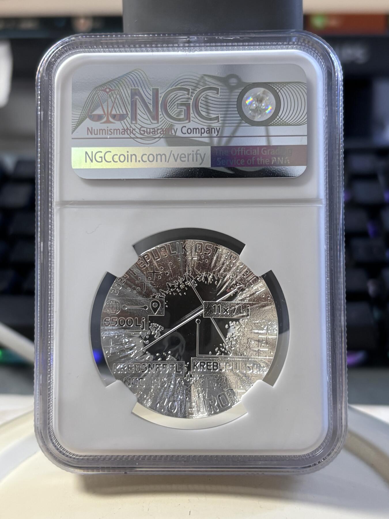 第186期拍卖 获奖币奥地利2024年宇宙之美系列超新星凹凸面22.42克彩色纪念银币NGC-PF69，925银，发行30000枚