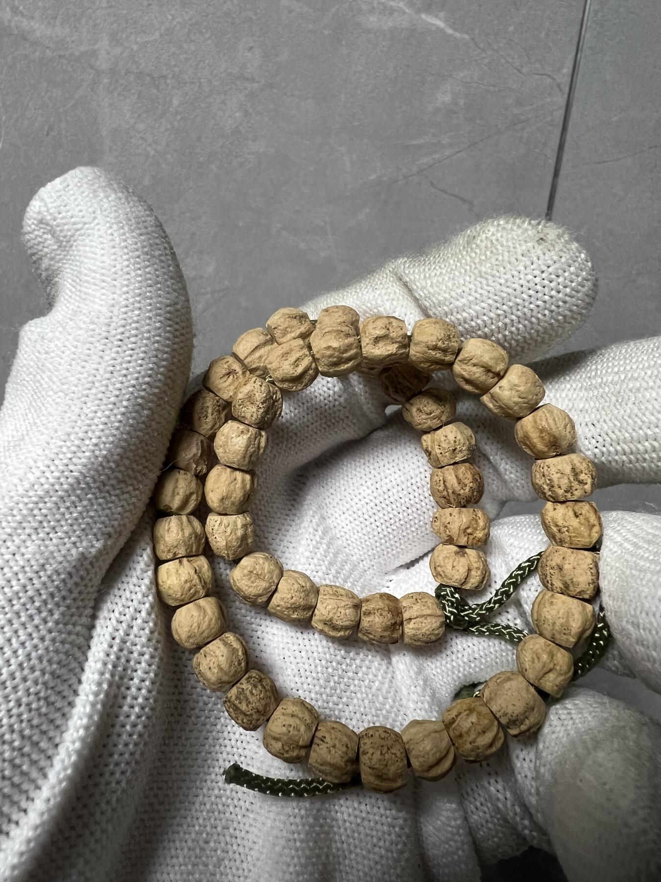 零元拍：百香籽 手持 手串 7/5MM左右