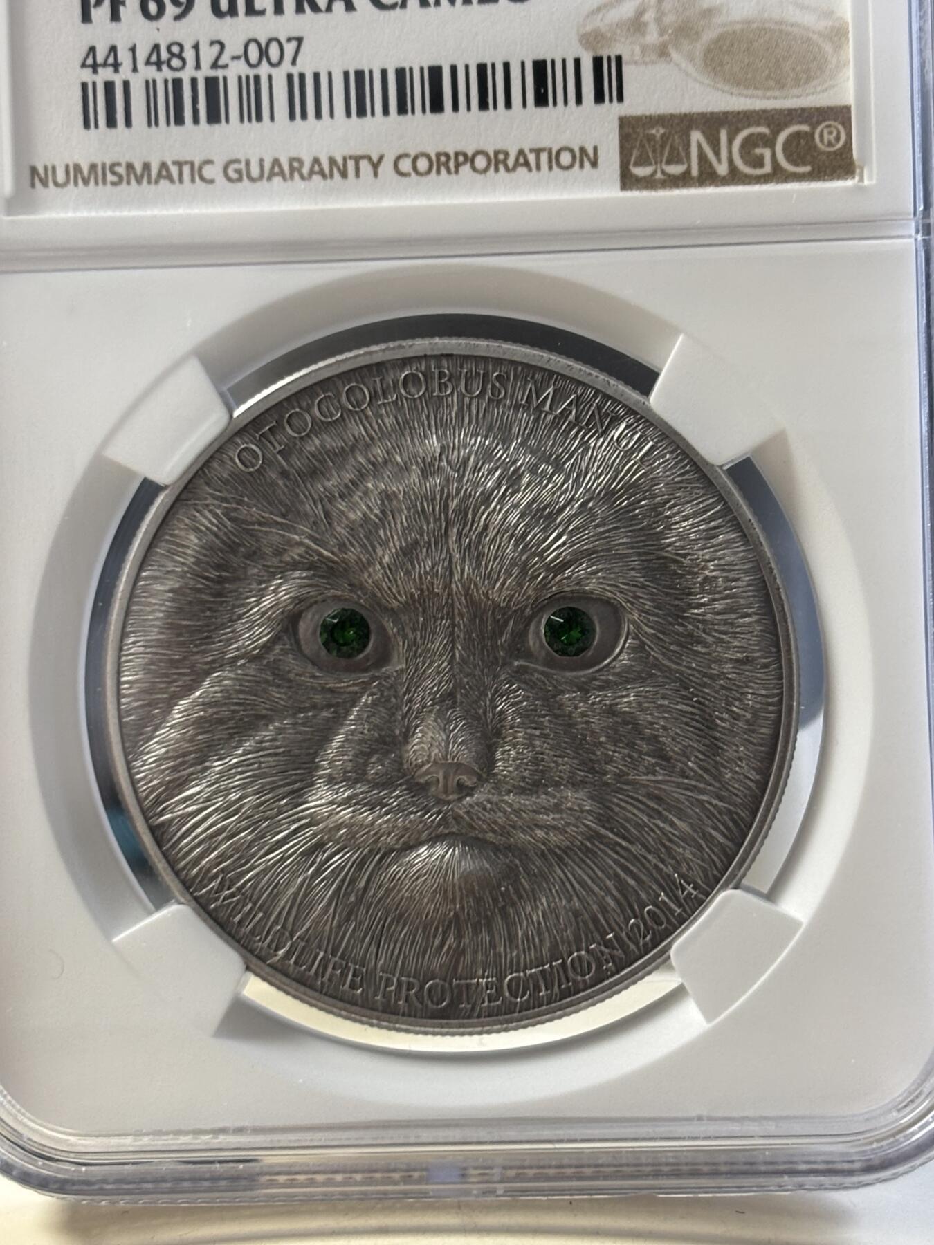 第186期拍卖 蒙古2014年草原动物系列兔狲仿古镶嵌水晶纪念银币NGC-PF69,1盎司，999银，发行2500枚