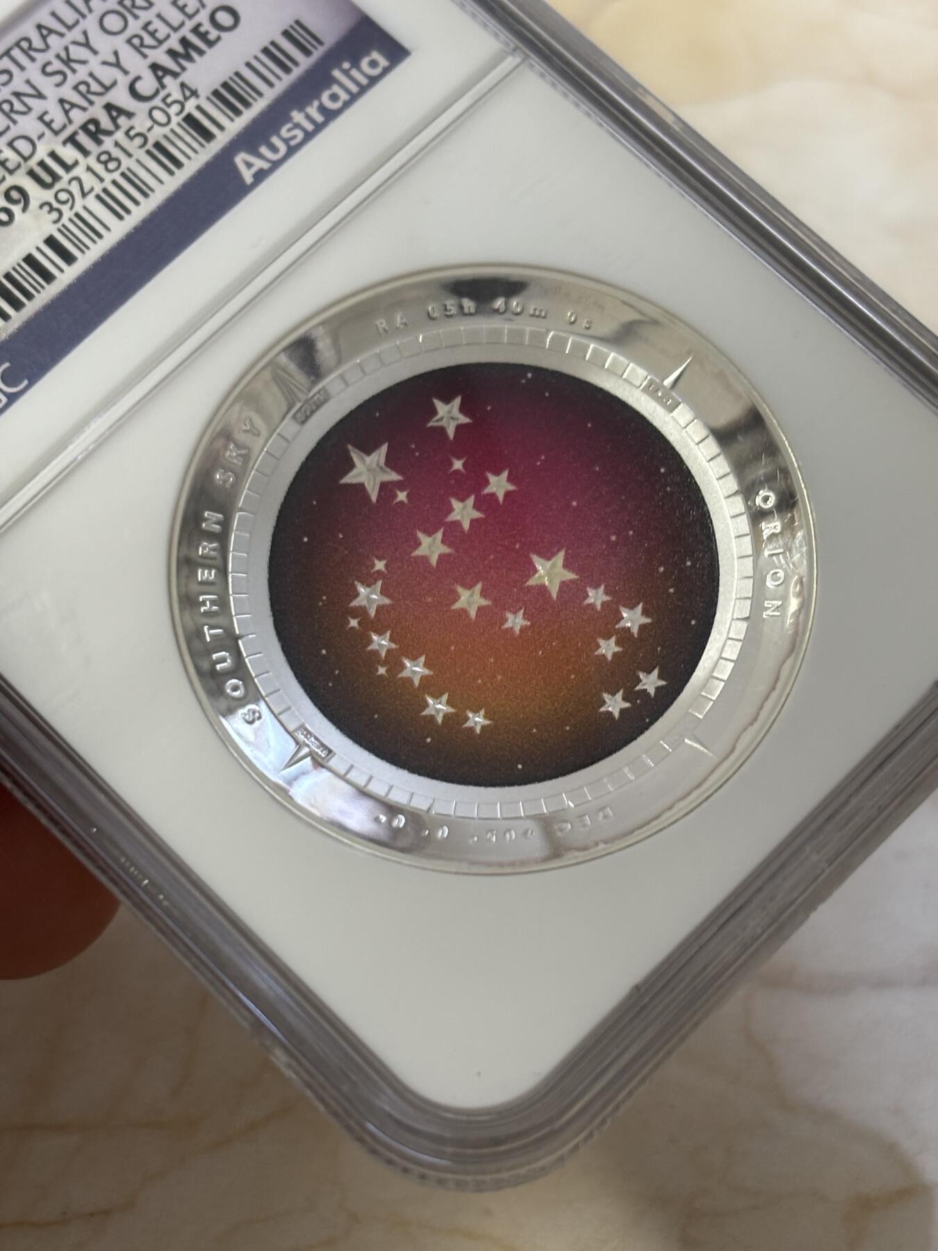 第186期拍卖 澳大利亚2014年南天星空系列3猎户座凹凸纪念1盎司彩色银币NGC-PF69，999银，发行10000枚