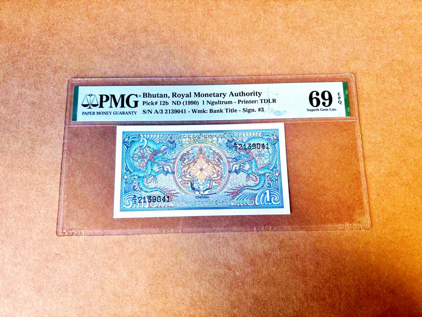 【Blue Auction】世界纸币精拍第771期——18级TOP拍卖/信誉/品质/专业/高效💫 【冠军分】不丹 1990年1努尔特鲁姆 PMG69EPQ 近满分