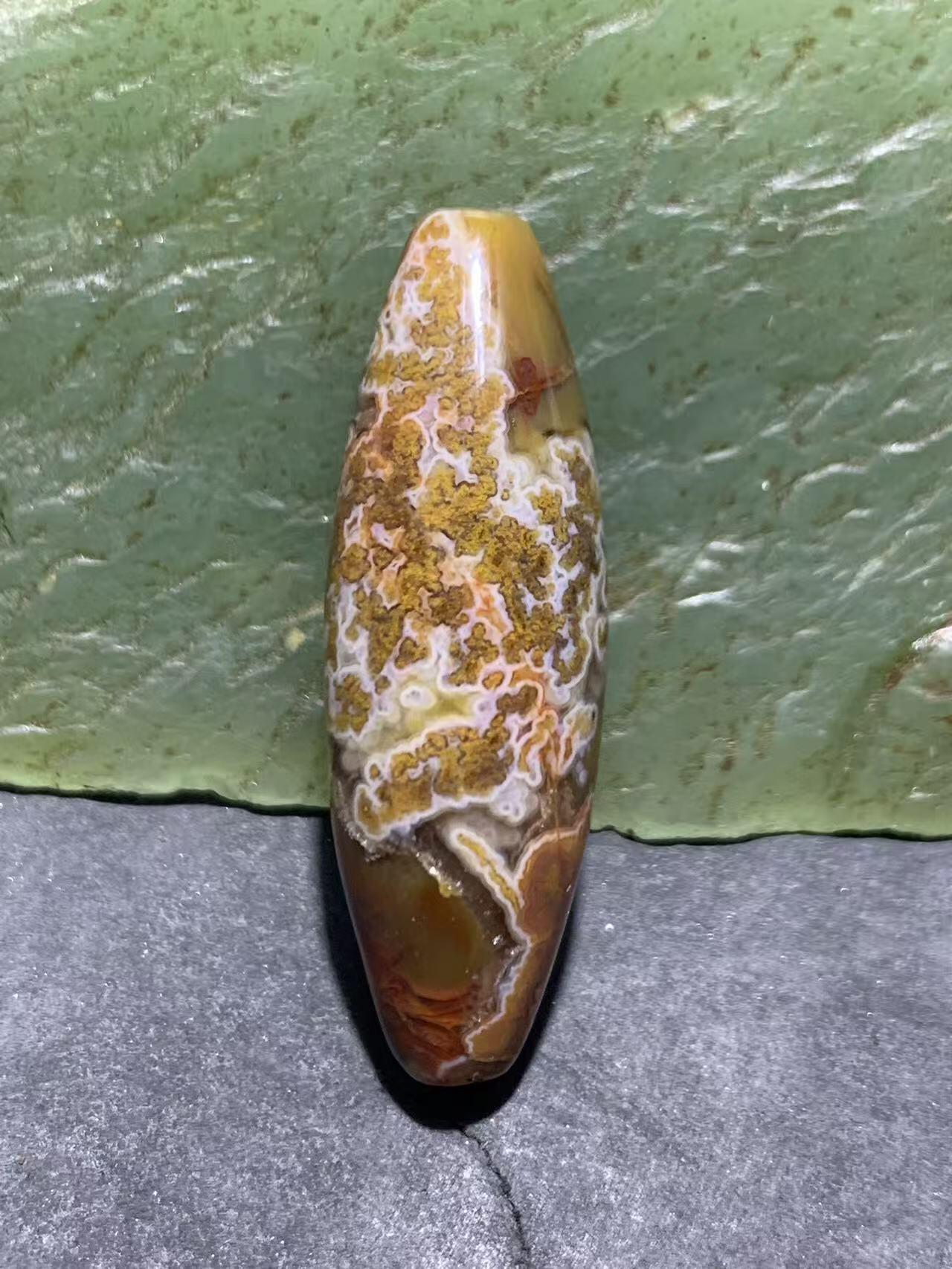 冻料草花纹战国红玛瑙天珠形通货桶珠一个