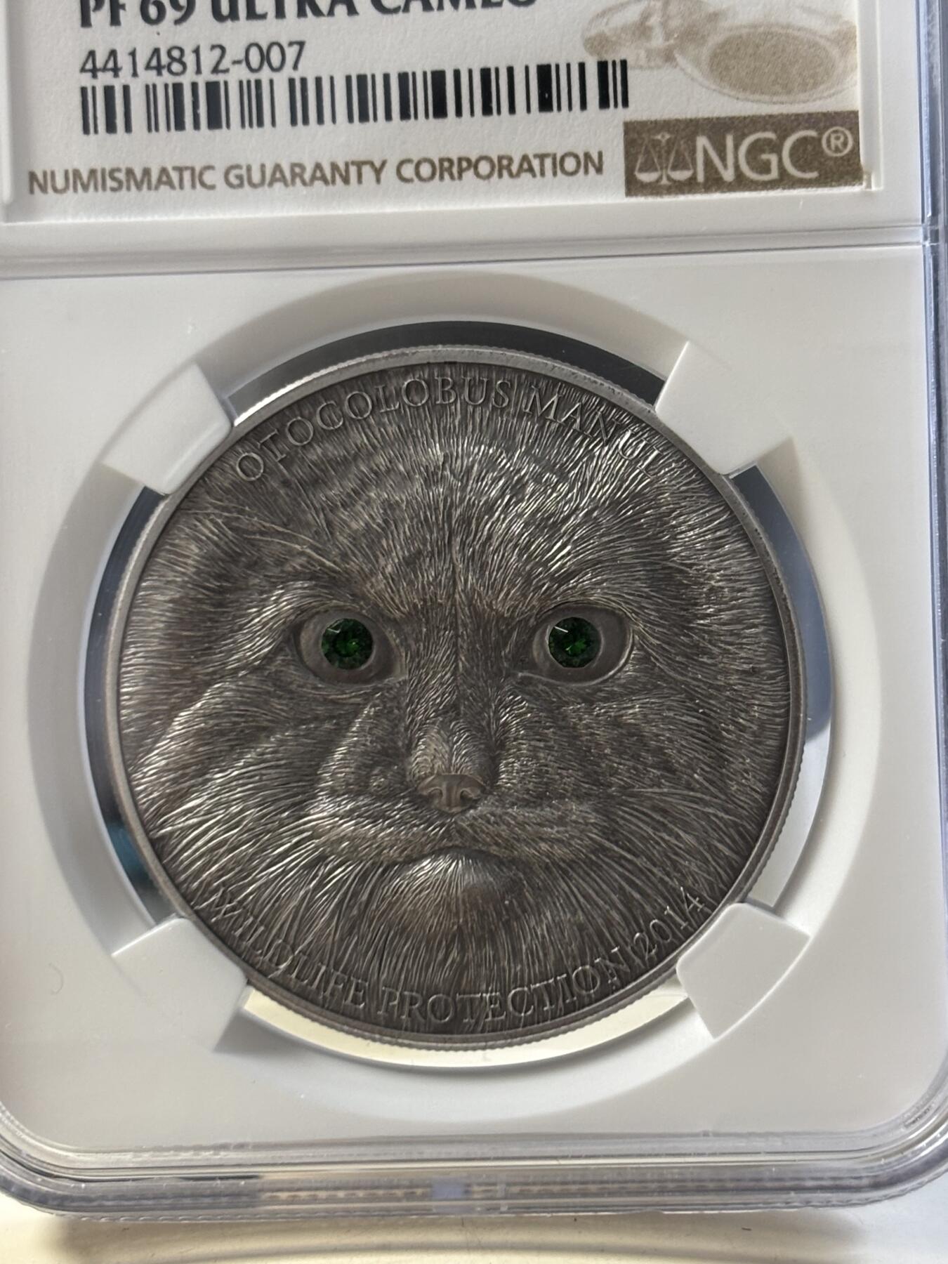 第186期拍卖 蒙古2014年草原动物系列兔狲仿古镶嵌水晶纪念银币NGC-PF69,1盎司，999银，发行2500枚