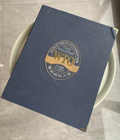 回流20260108 - 鸽子重拍 中国钱币公司2000年发行 世界贸易组织120个成员国硬币 小日本2002年3000元购于北京通州邮政局集邮门市部（附收据）