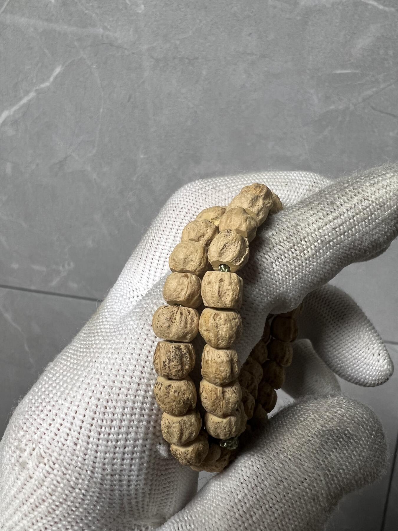 零元拍：百香籽 手持 手串 7/5MM左右