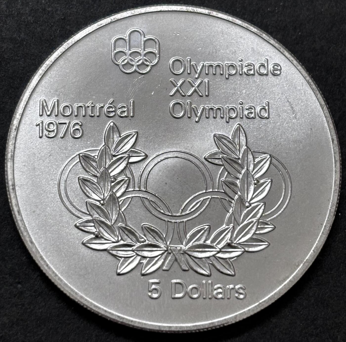 文馨钱币收藏 迎新纳福2026新年第一场（第 287 场）金银老铜币拍卖 原光品相 1974 年加拿大蒙特利亚第 21 届夏季奥林匹克运动会吊环系列赛 5 元纪念大银币，24.3 克 925 高银，品相可评级