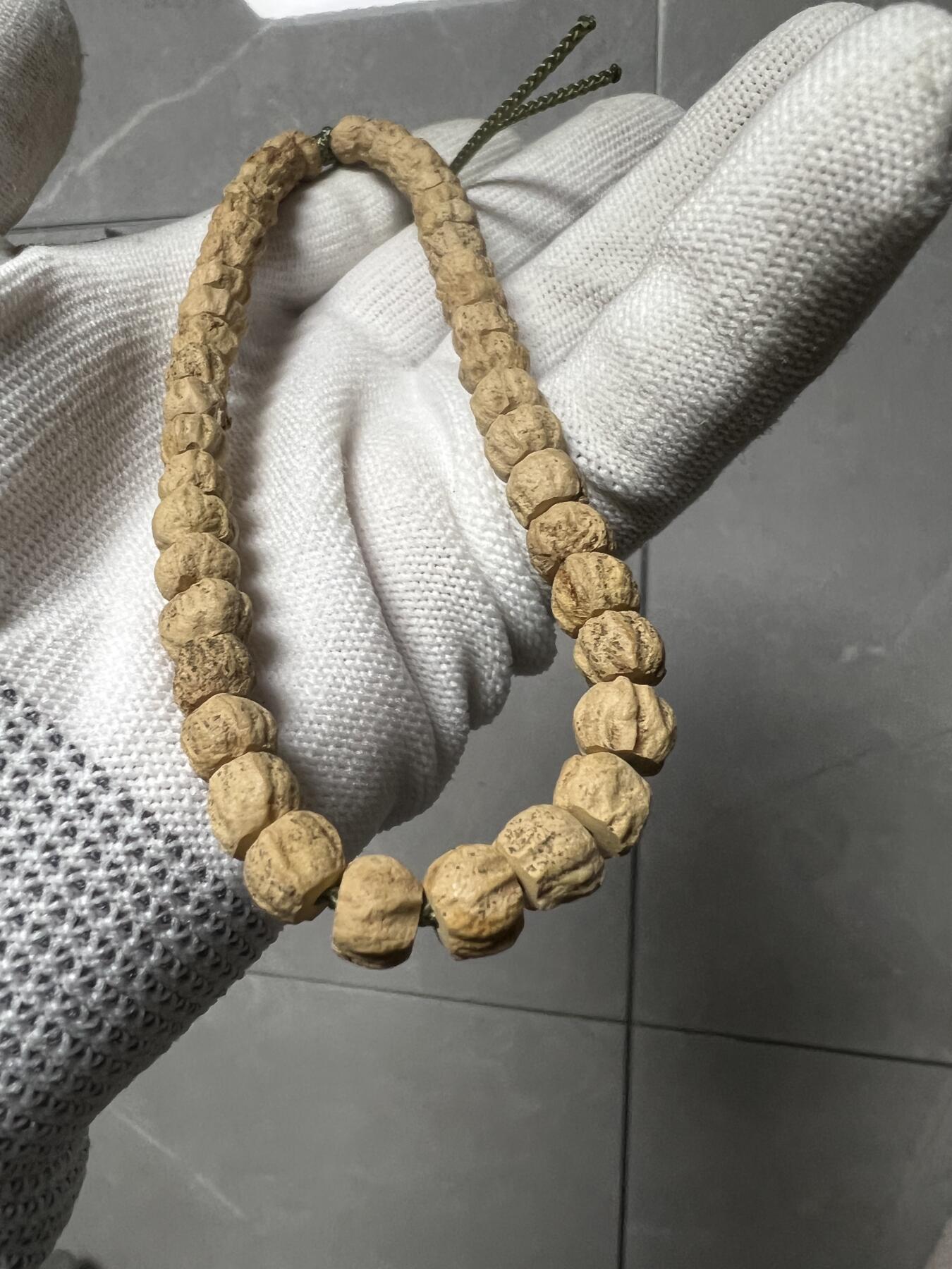 零元拍：百香籽 手持 手串 7/5MM左右