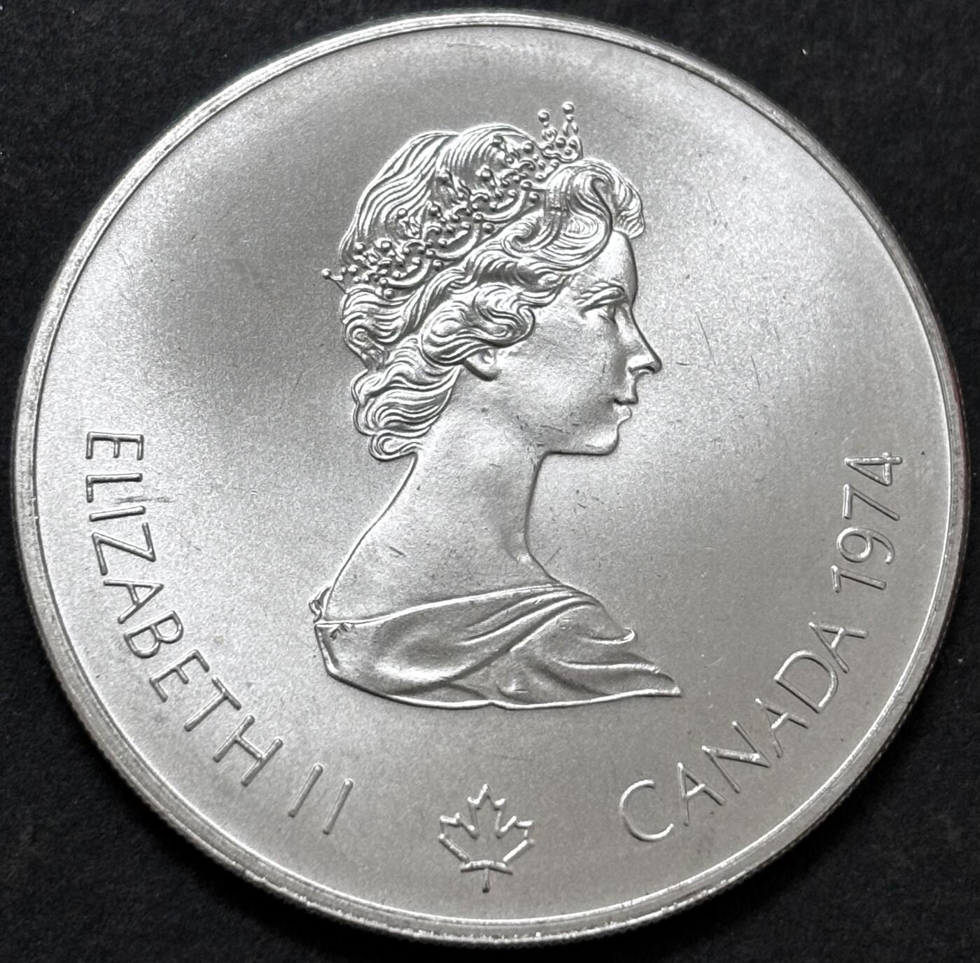 文馨钱币收藏 迎新纳福2026新年第一场（第 287 场）金银老铜币拍卖 原光品相 1974 年加拿大蒙特利尔第 21 届夏季奥林匹克运动会火炬手系列 5 元纪念大银币，24.3 克 925 高银，品相可评级