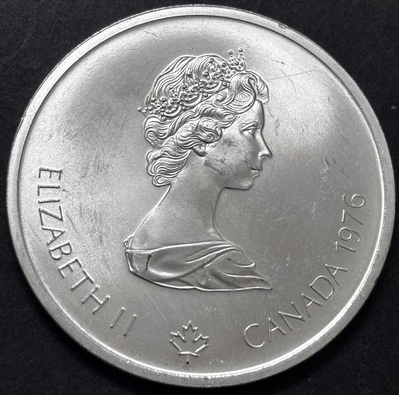 文馨钱币收藏 迎新纳福2026新年第一场（第 287 场）金银老铜币拍卖 原光品相 1976 年加拿大蒙特利尔第 21 届夏季奥林匹克运动会赛车场系列 10 元大型纪念银币 48.6 克 925 高银，品相可评级