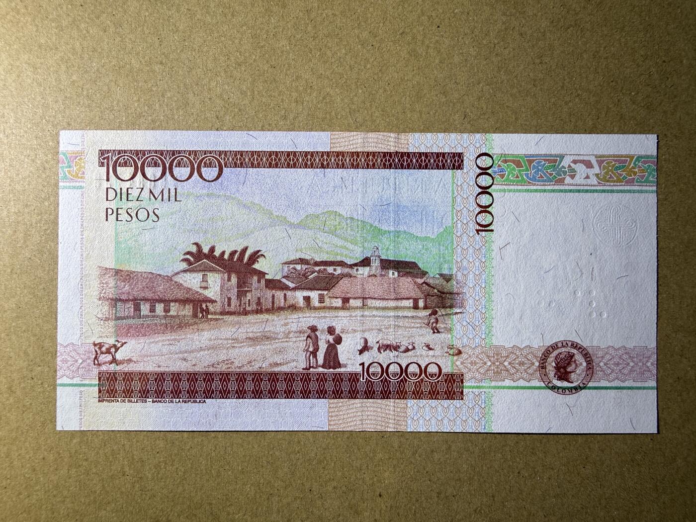 《艾美收藏》第227期-1.3周六外币黄金场-马年首拍 哥伦比亚10000比索 UNC 2014年 无4尾8