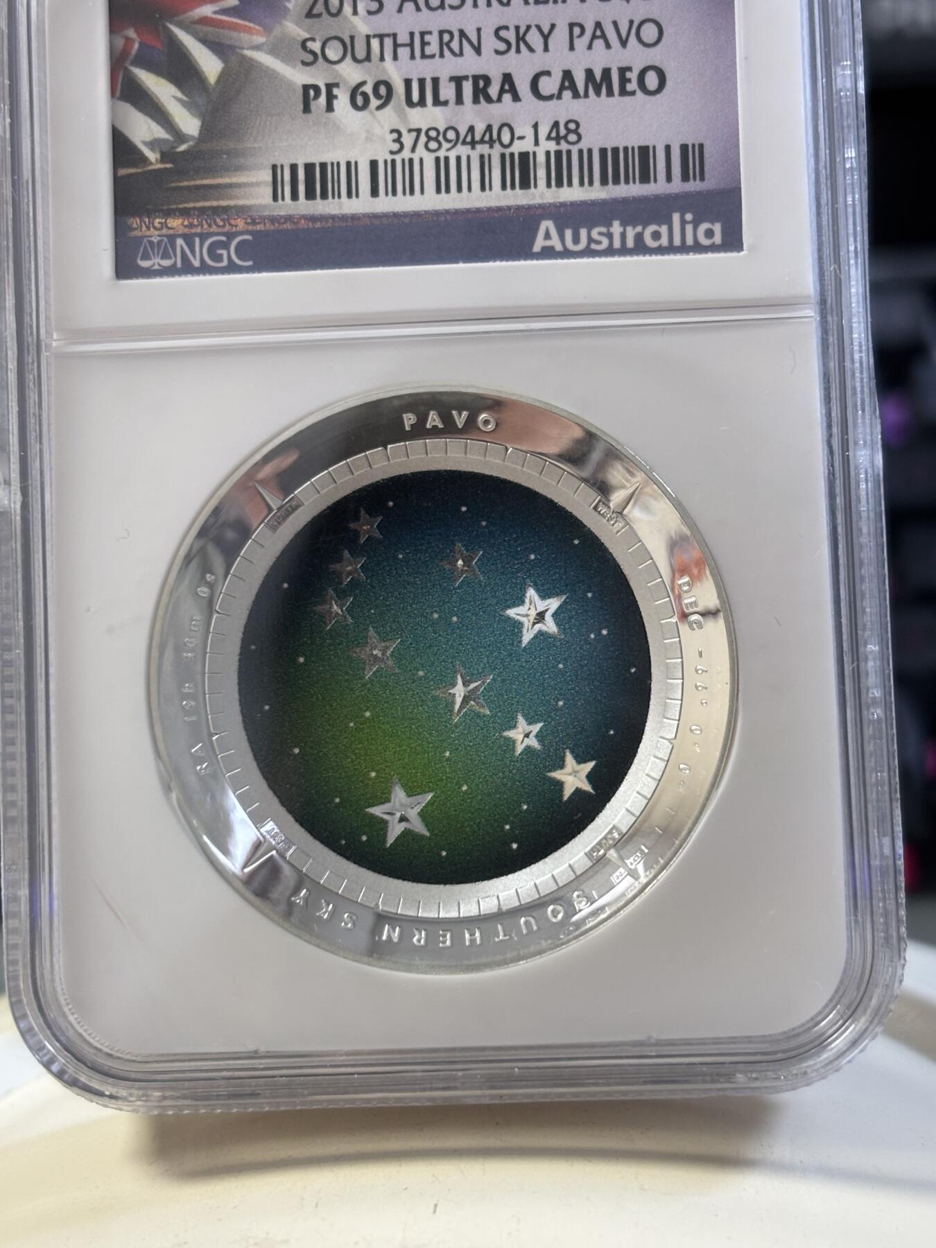 第186期拍卖 澳大利亚2013年南天星空系列2孔雀座凹凸纪念1盎司彩色银币NGC-PF69，999银，发行10000枚