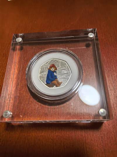 长老汇蛇年精选第九十一场拍卖 - 2018英国帕丁顿熊50便士彩色七边精制银币，925银，6万枚，市场价500元