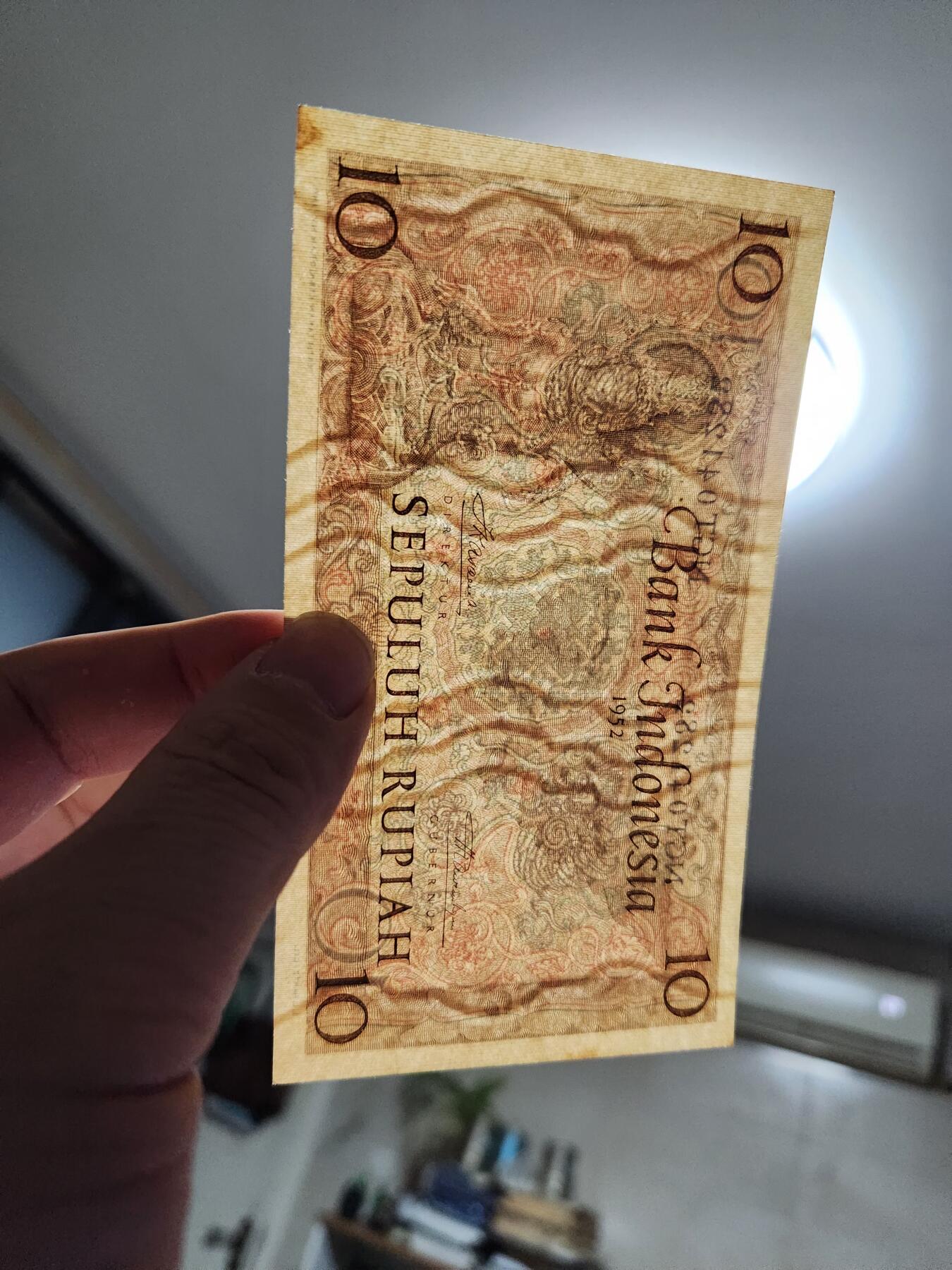 1月2号晚上8点 外国纸币自动截拍第78场 印度尼西亚10 新品一点黄