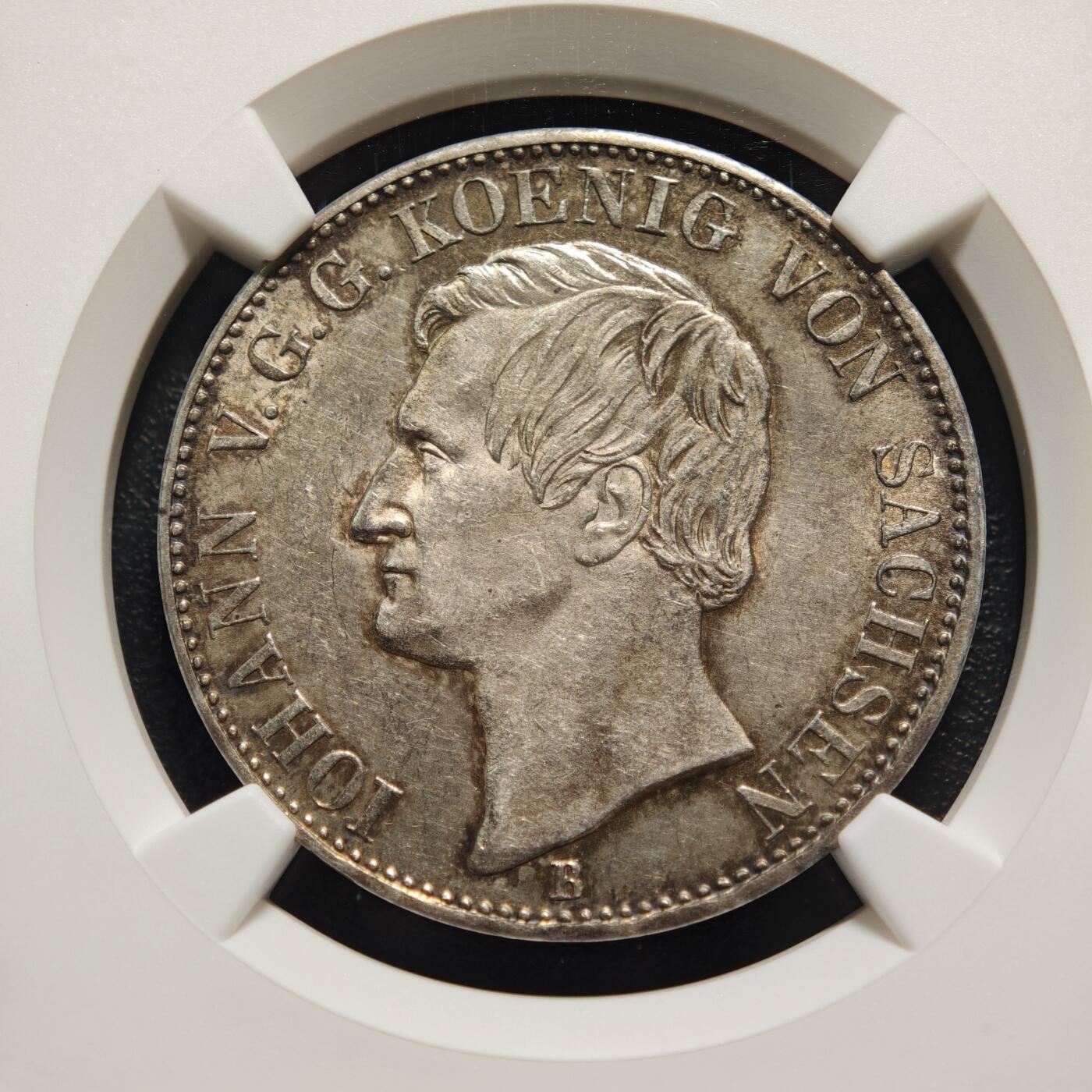 【德藏】世界币章拍卖第160期 1865年 德国萨克森王国矿业1泰勒银币 酱彩环状包浆状态好 NGC UNC