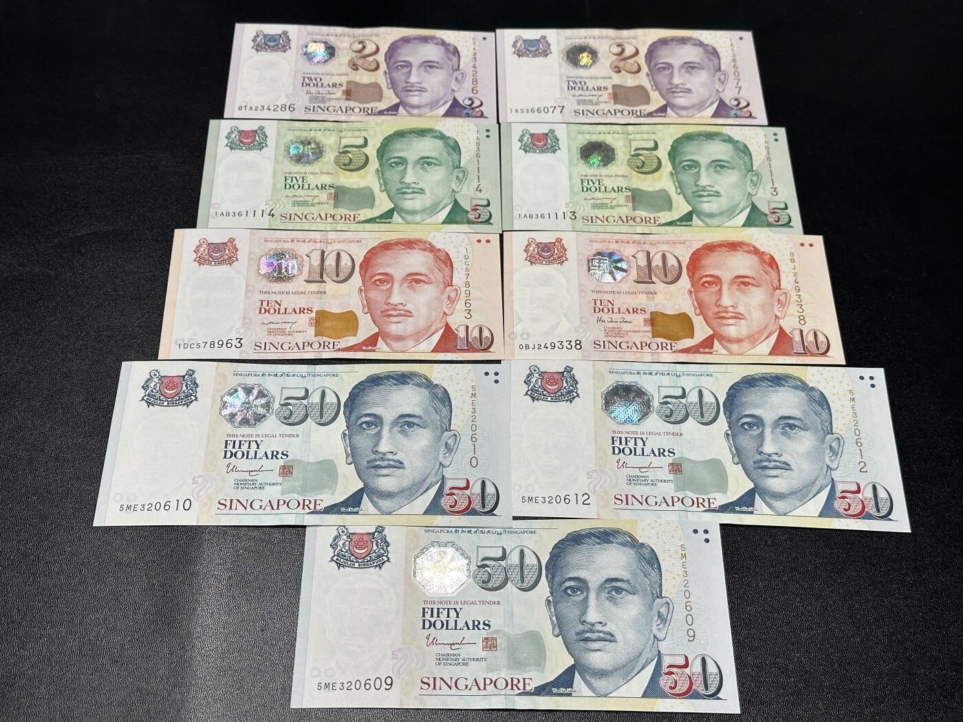 《外钞收藏家》第五百九十九期（畅拍场）（本平台长期征集拍品、欢迎藏友们联系合作） 新加坡人像纸币版2-50元 共184元 全新 有两张轻微荧光瑕疵