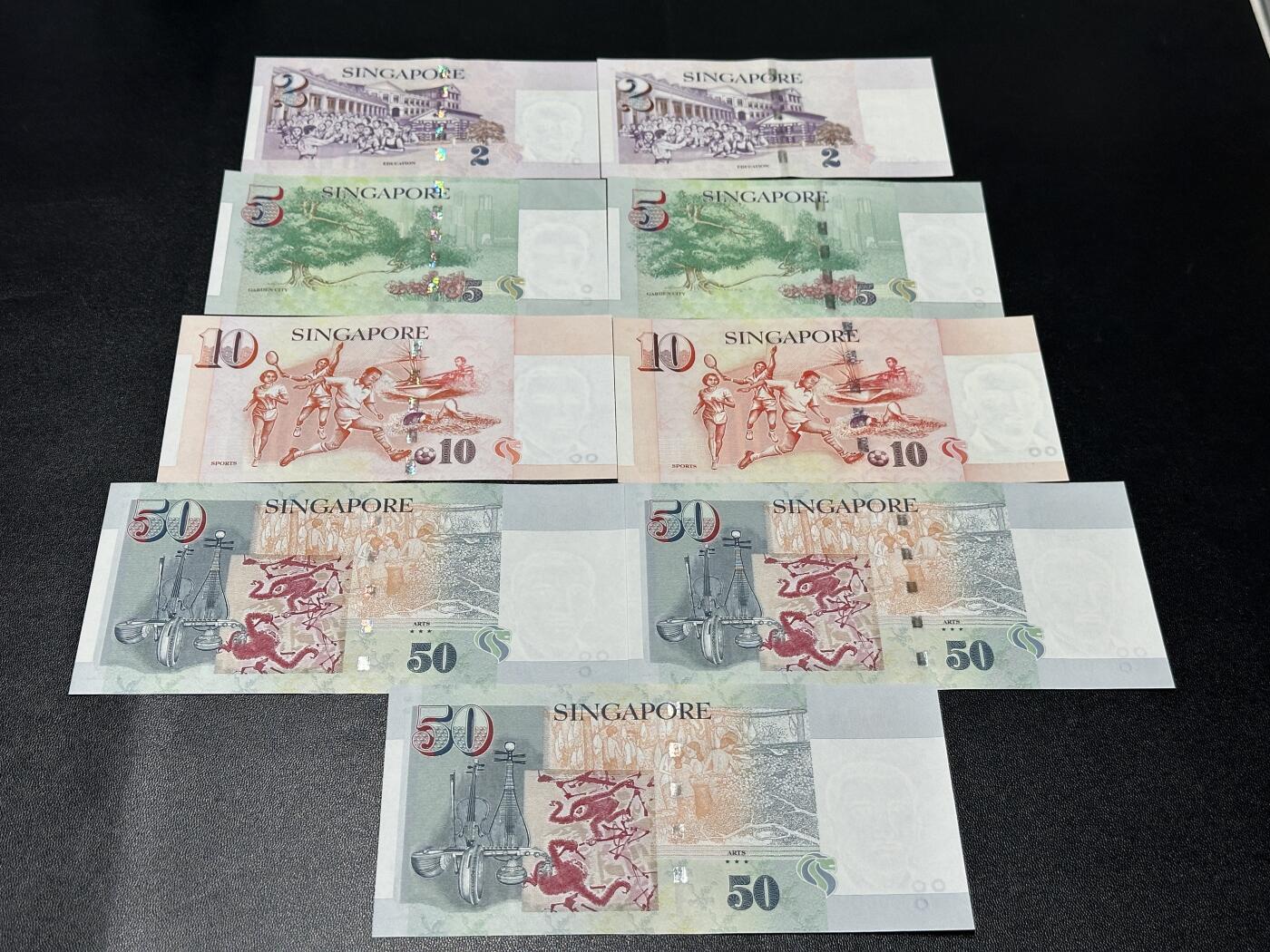 《外钞收藏家》第五百九十九期（畅拍场）（本平台长期征集拍品、欢迎藏友们联系合作） 新加坡人像纸币版2-50元 共184元 全新 有两张轻微荧光瑕疵