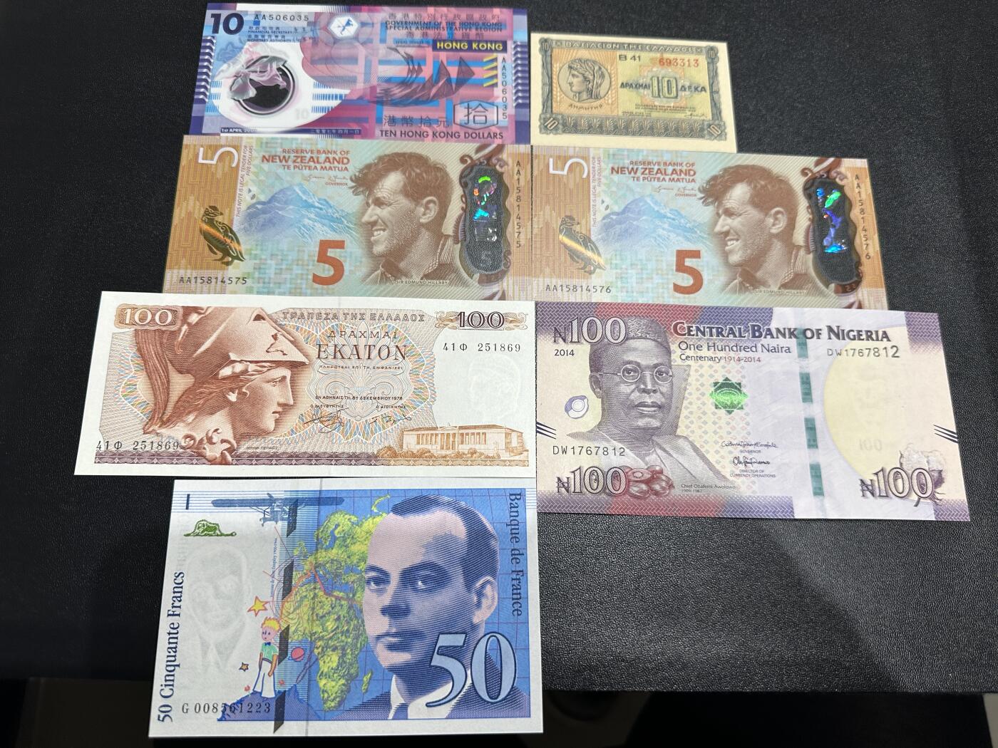 《外钞收藏家》第五百九十九期（畅拍场）（本平台长期征集拍品、欢迎藏友们联系合作） AA10港币+AA新西兰5元2张+希腊10和100+尼日利亚+法国50法郎 7张一起 全新UNC