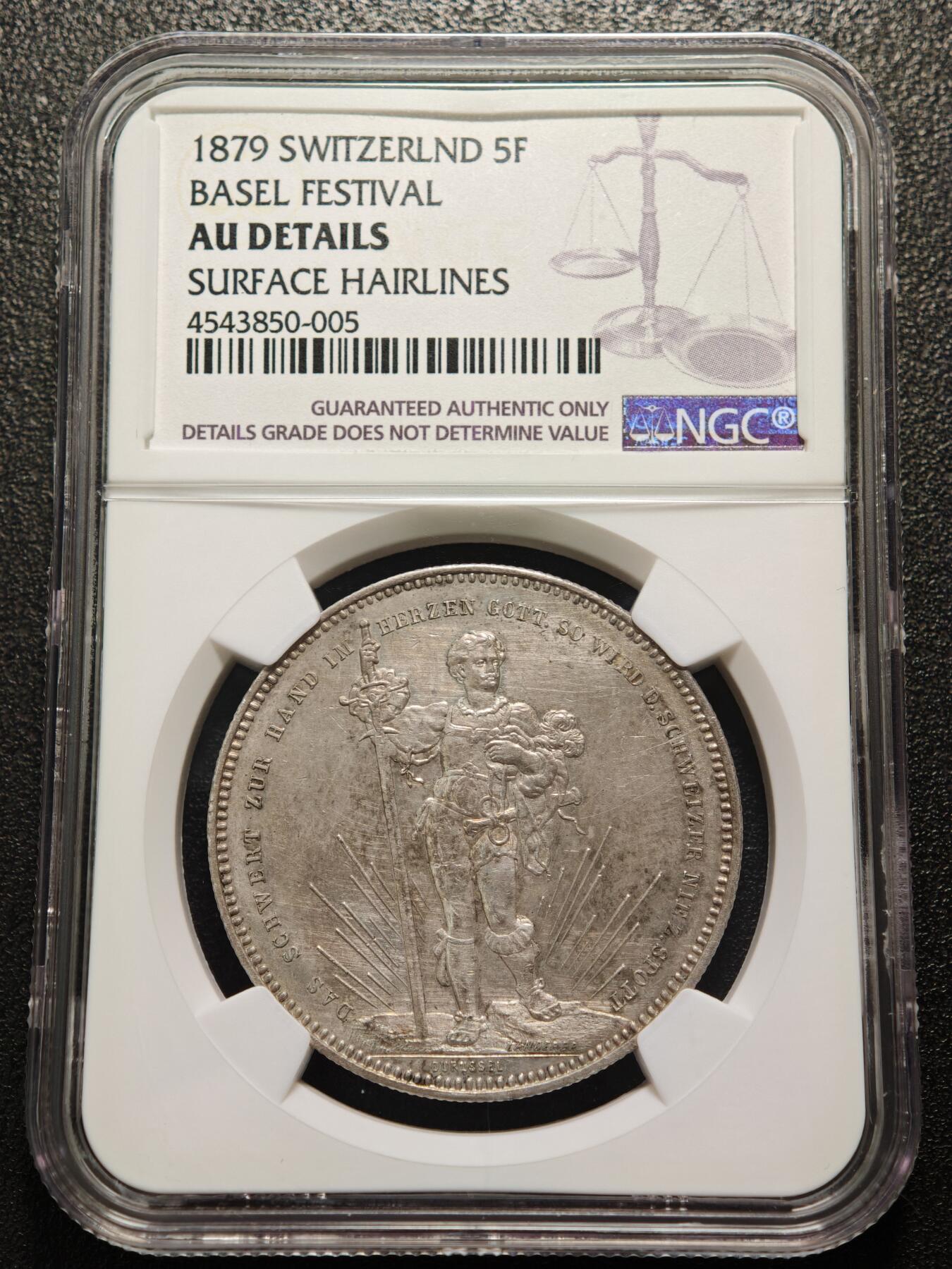 【德藏】世界币章拍卖第160期 1879年 瑞士巴塞尔射击节5法郎纪念银币 NGC AU 发行量30000枚 正面是手持长剑的士兵形象 背面是瑞士联邦徽章和鹰头图案 铸造精美 淡淡包浆 品相完好