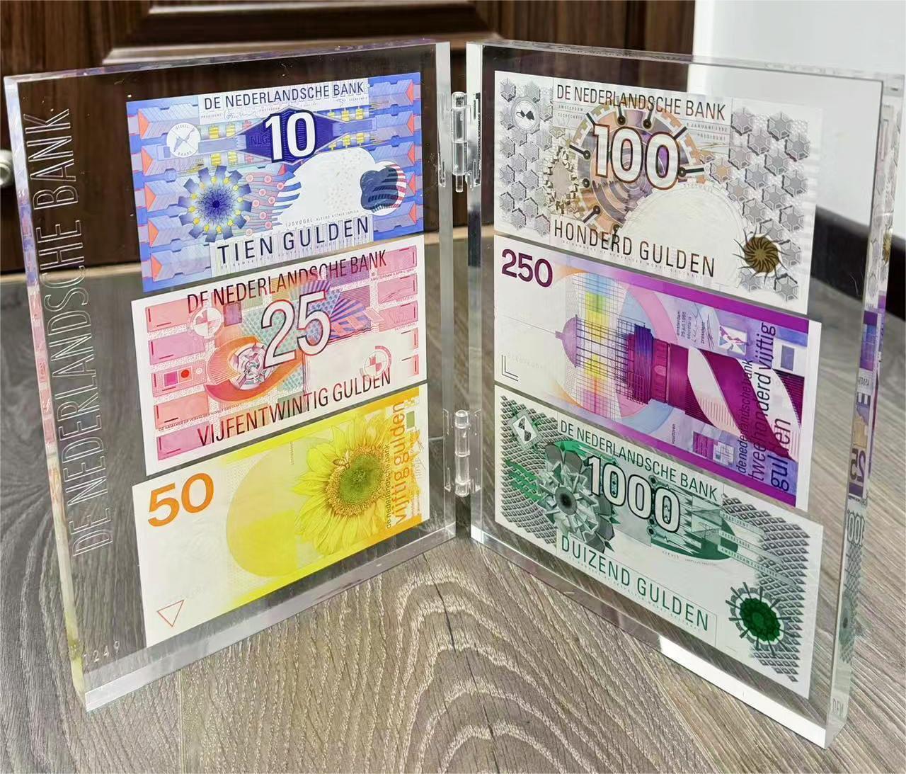 《外钞收藏家》第五百九十九期（畅拍场）（本平台长期征集拍品、欢迎藏友们联系合作） 荷兰10-1000盾 6张一起 精美封装摆件 脚链可正常使用 有点小裂