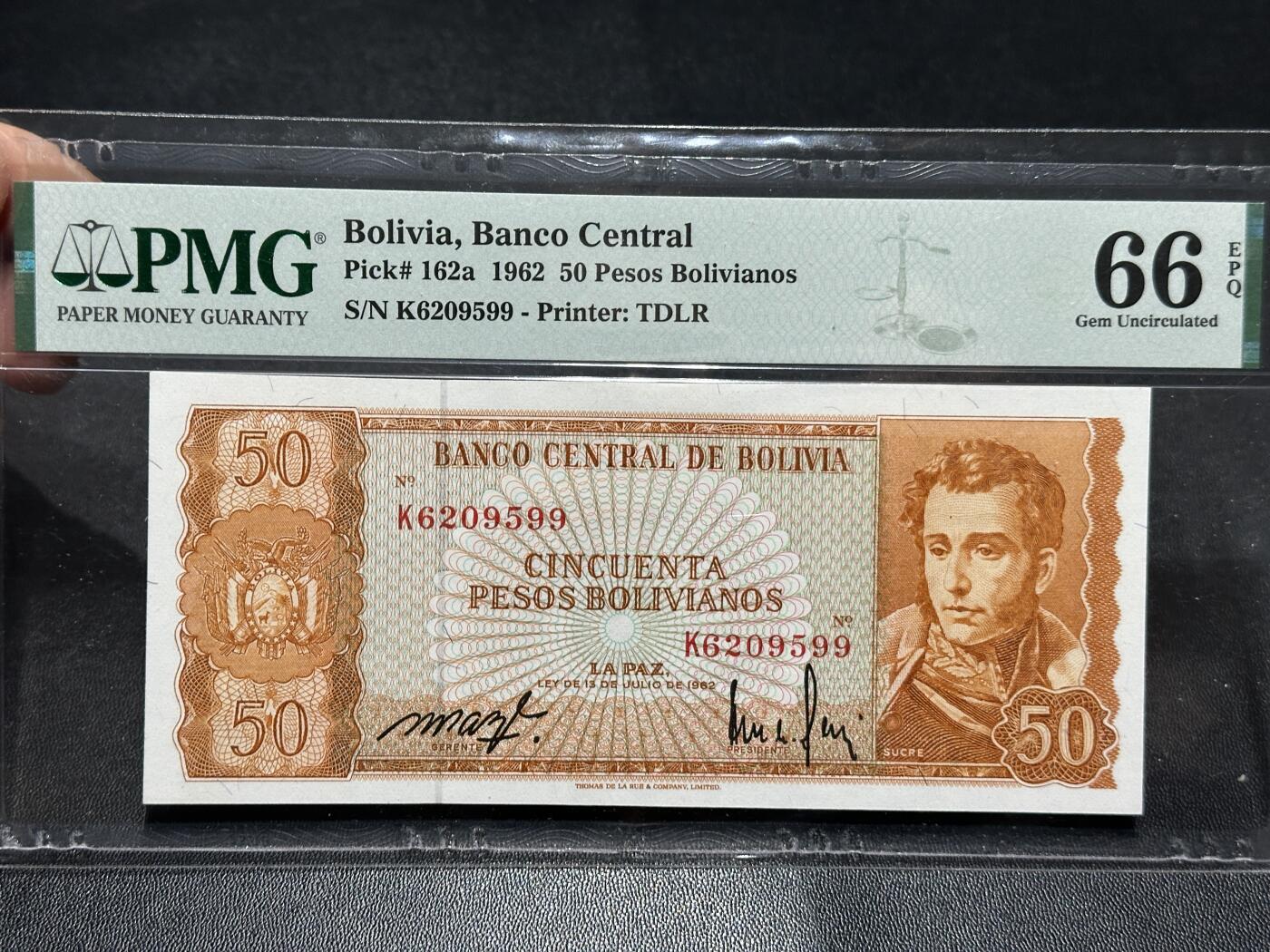 《外钞收藏家》第五百九十九期（畅拍场）（本平台长期征集拍品、欢迎藏友们联系合作） 1962年玻利维亚50比索 PMG66 无47靓号