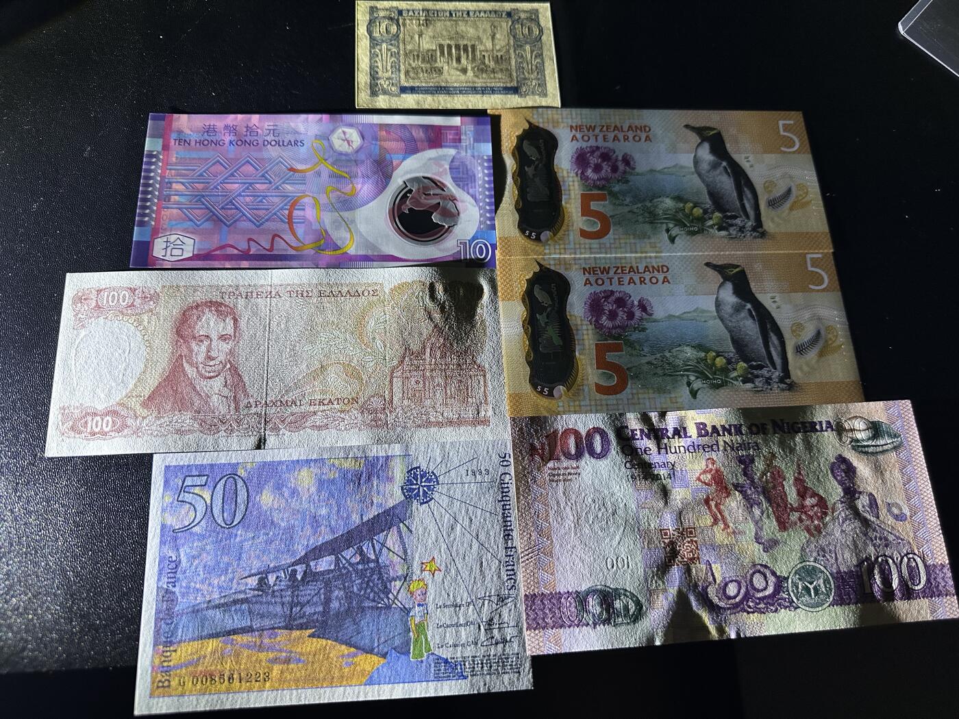 《外钞收藏家》第五百九十九期（畅拍场）（本平台长期征集拍品、欢迎藏友们联系合作） AA10港币+AA新西兰5元2张+希腊10和100+尼日利亚+法国50法郎 7张一起 全新UNC