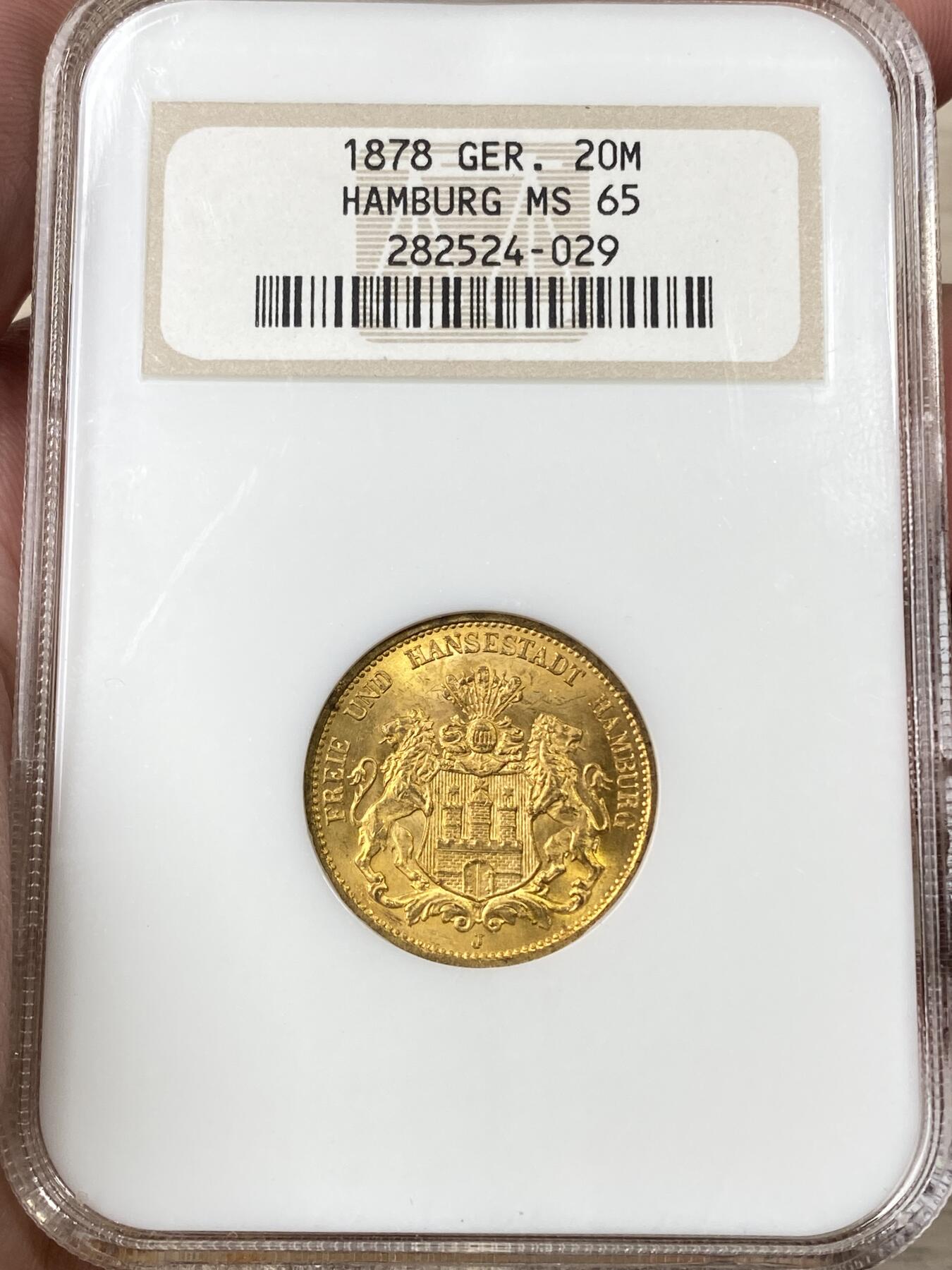 万国钱币拍卖第058期（万国新年大拍） NGC MS65 1878年德国汉堡自由市流通短翅20马克金币 经典汉堡自由市早期双狮短翅 无论光度还是底板都无可挑剔的近GEM品质  NGC老白盒典藏级 7.96g 900金