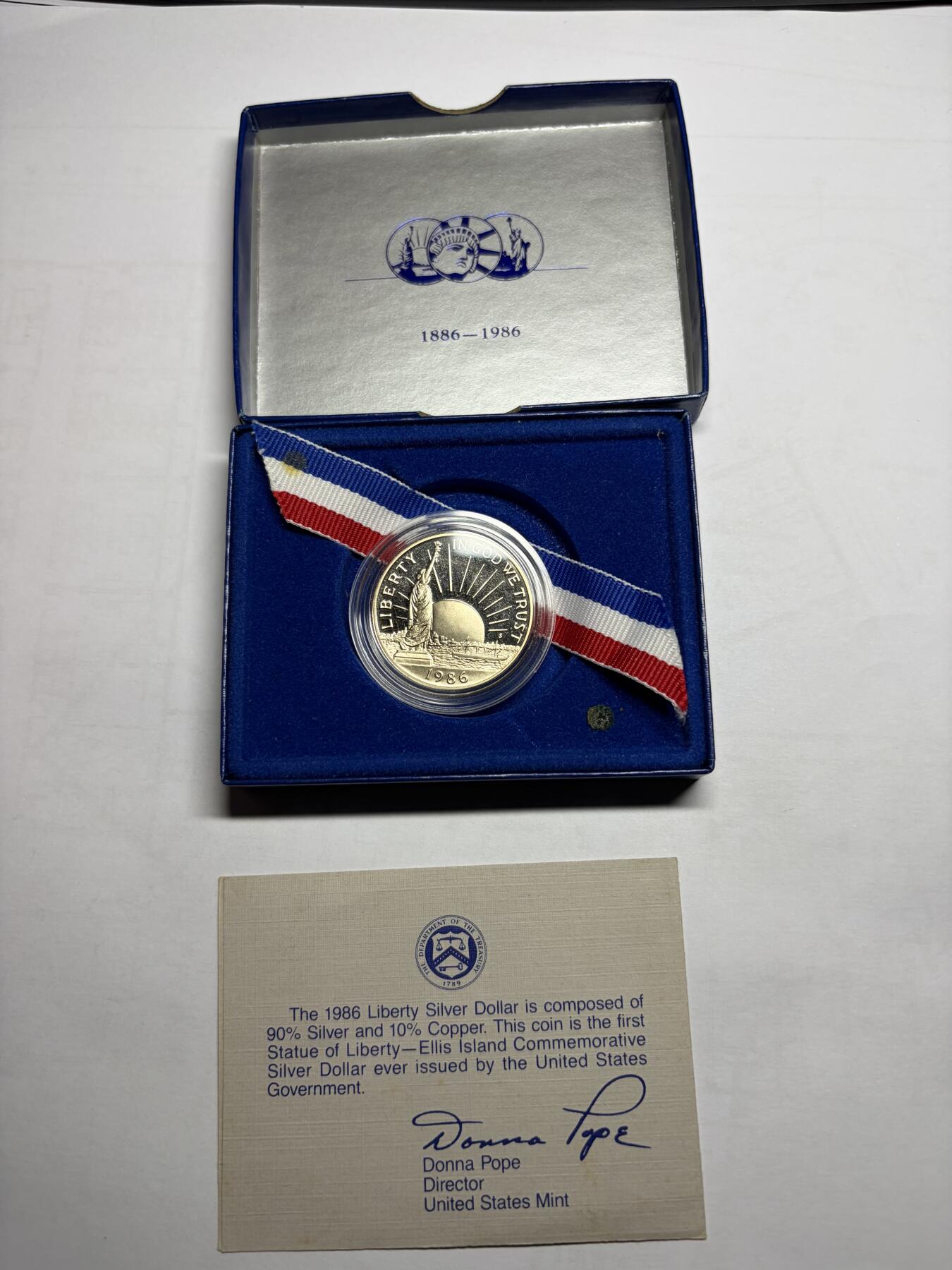 2026年集古藏今外币拍卖第一期-第2场—（总第299拍），可以寄存60天，满160元包邮。 1986年美国半美元精制币，盒后配