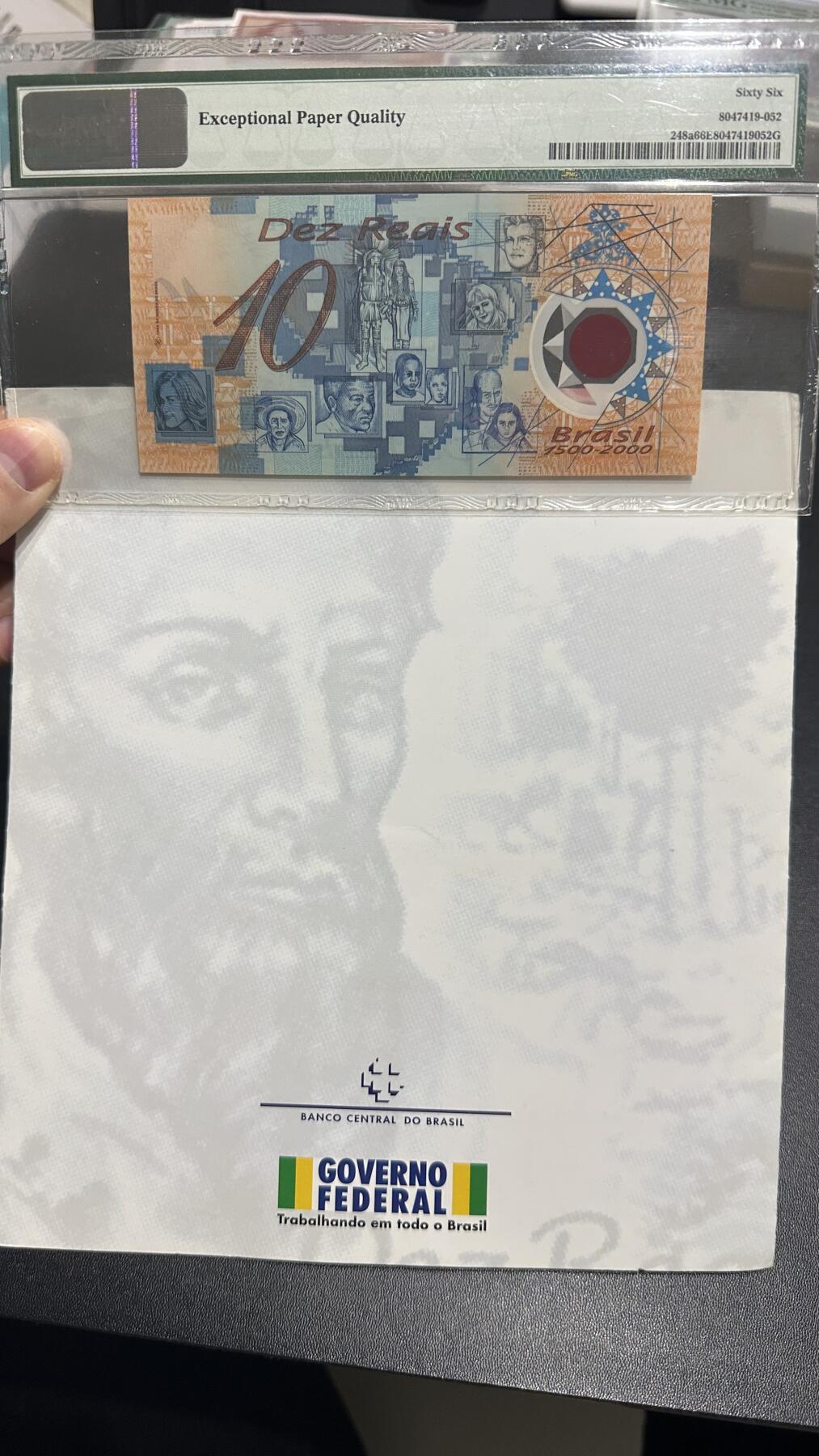 🎉🎉🎉《外钞收藏家》第六百期（年度庆典场）（本平台长期征集拍品、欢迎藏友们联系合作）❤️❤️❤️ 2000年巴西10里亚尔 纪念钞 PMG66 带原装册子