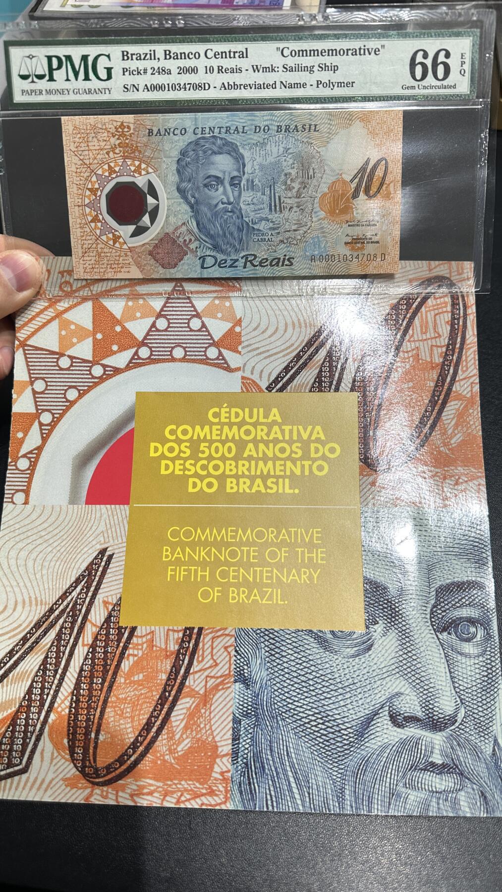 🎉🎉🎉《外钞收藏家》第六百期（年度庆典场）（本平台长期征集拍品、欢迎藏友们联系合作）❤️❤️❤️ 2000年巴西10里亚尔 纪念钞 PMG66 带原装册子