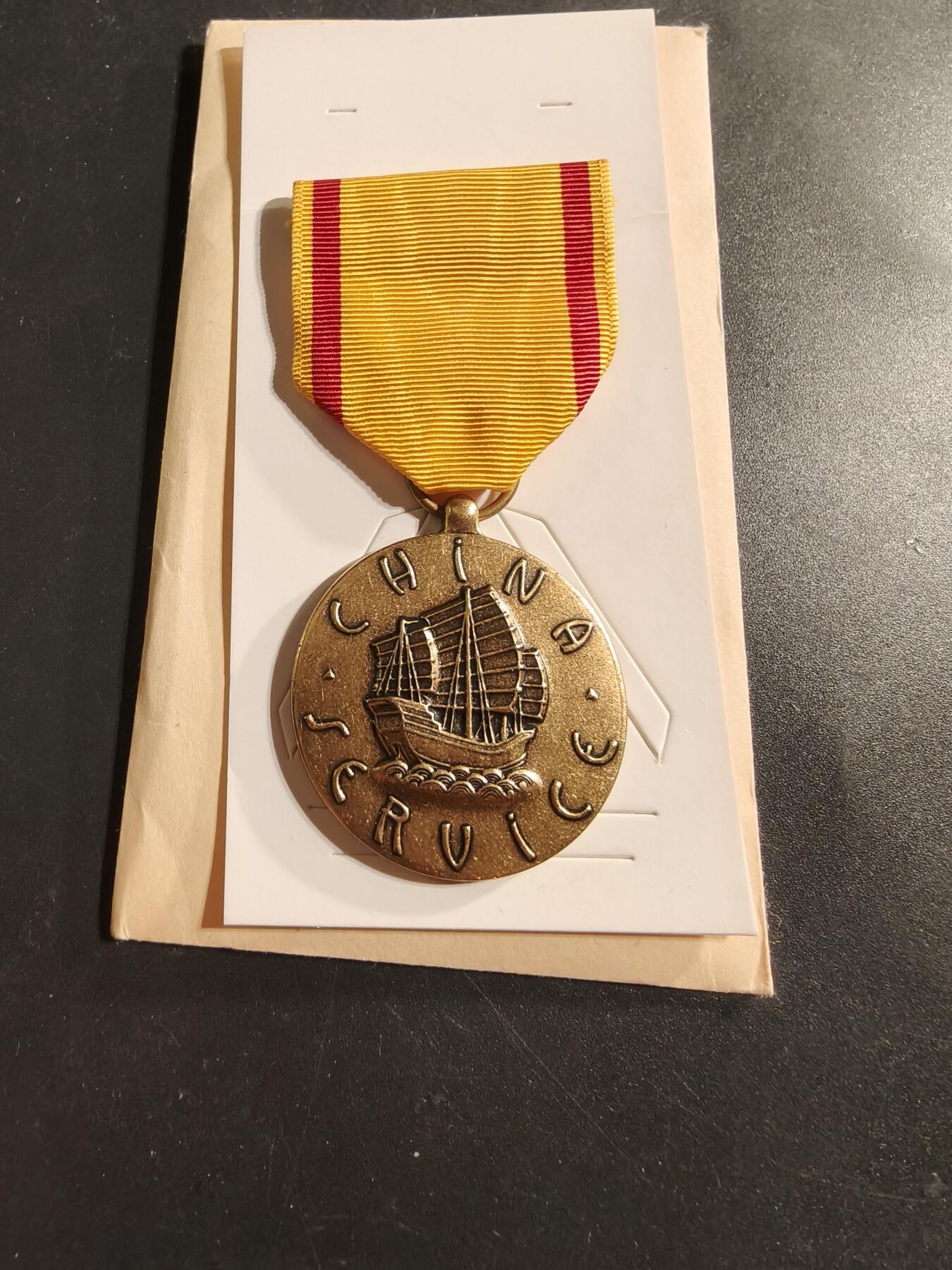 老王徽章第174期 美国海军二战中国服役奖章    原纸袋