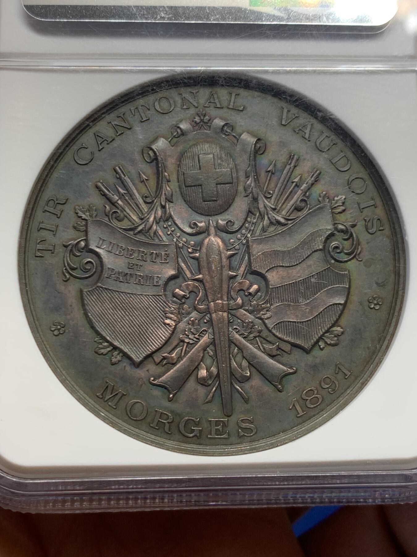 《竞宝斋》第454场 周日，周一 2场连拍 （全场包邮，欢迎送拍） NGC UNC 瑞士1891沃州射击节铜章 巧克力色 人物生动 细节保存非常好 加厚盒装