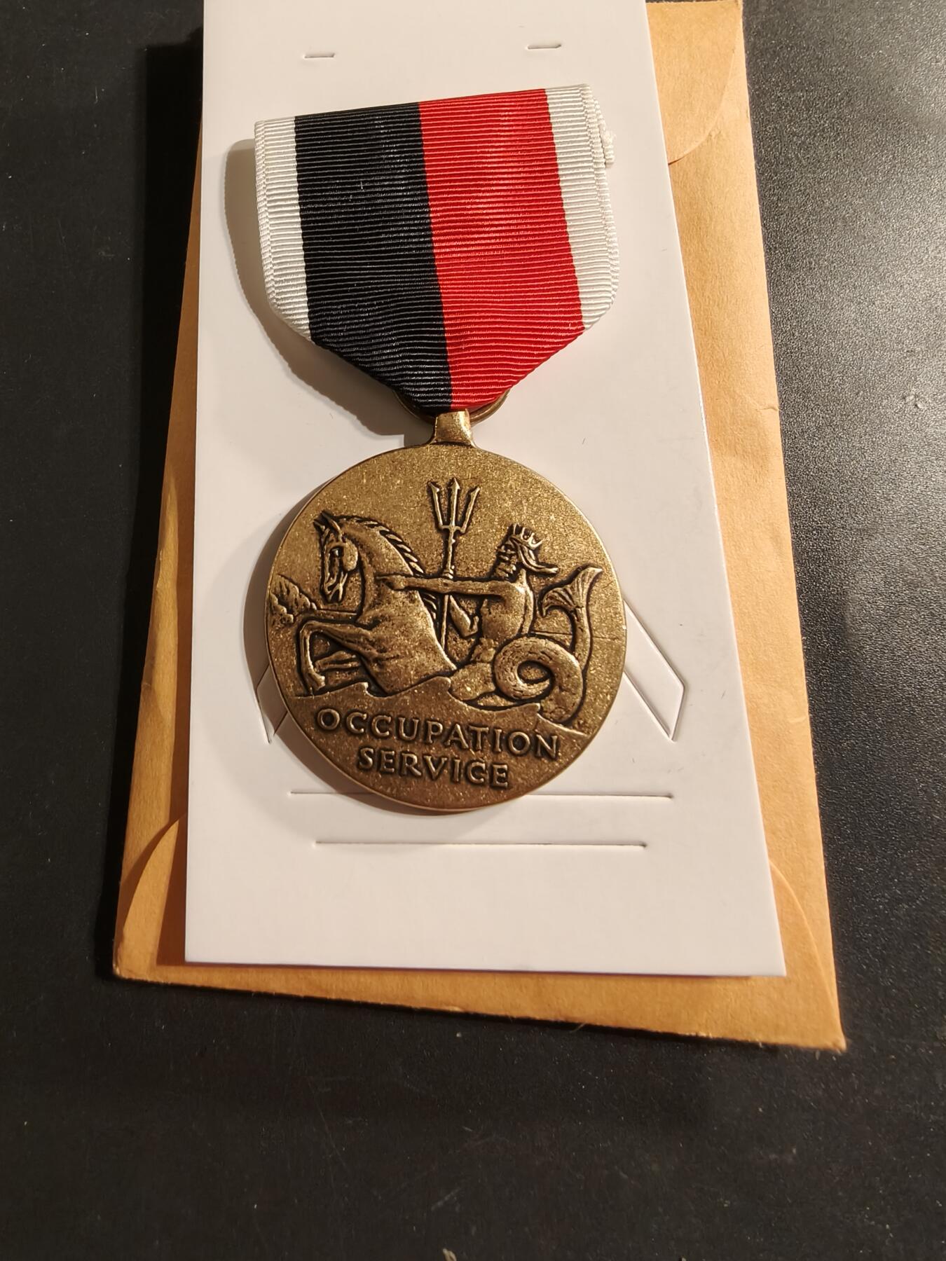 老王徽章第174期 美国海军二战占领军服役奖章     原纸袋