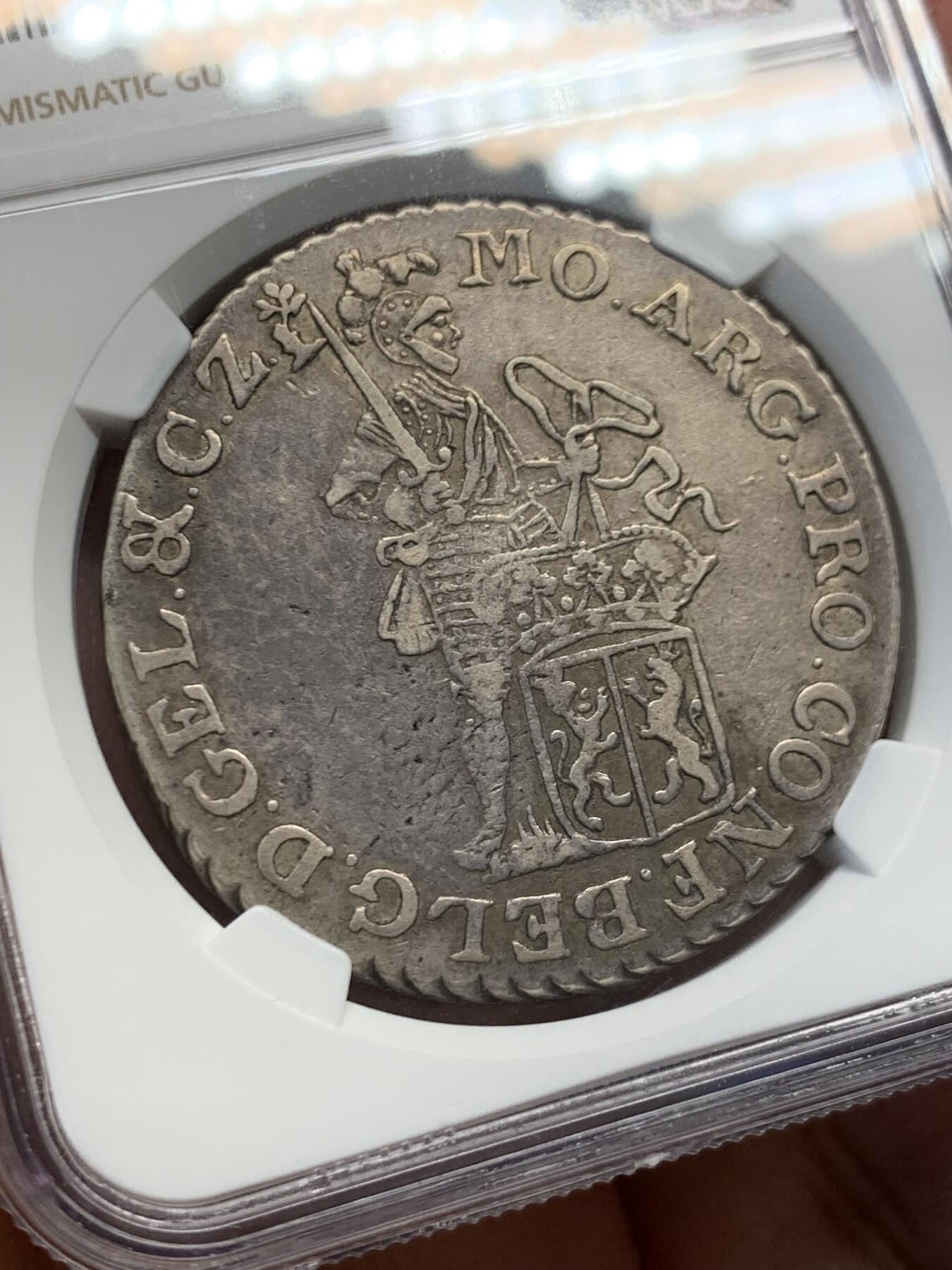 《竞宝斋》第454场 周日，周一 2场连拍 （全场包邮，欢迎送拍） NGC XF 荷兰 格尔德兰省 1775年 1杜卡特 银币 荷兰三剑客之一的武士银币 这个省份比较少见 极美黑包浆 细节不错 热门品种