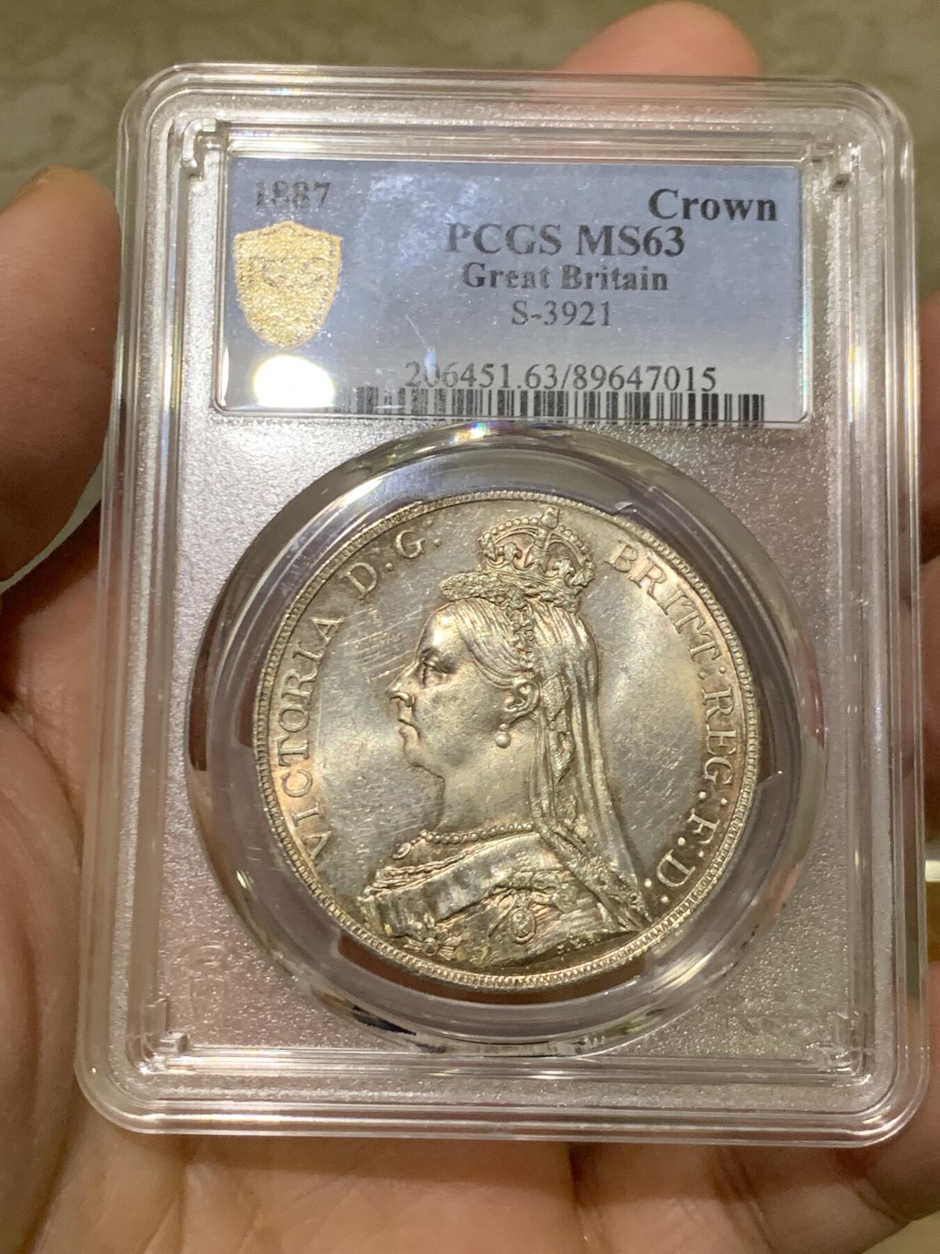 《竞宝斋》第454场 周日，周一 2场连拍 （全场包邮，欢迎送拍） PCGS MS63 英国1887年维多利亚女王高冠马剑1克朗银币