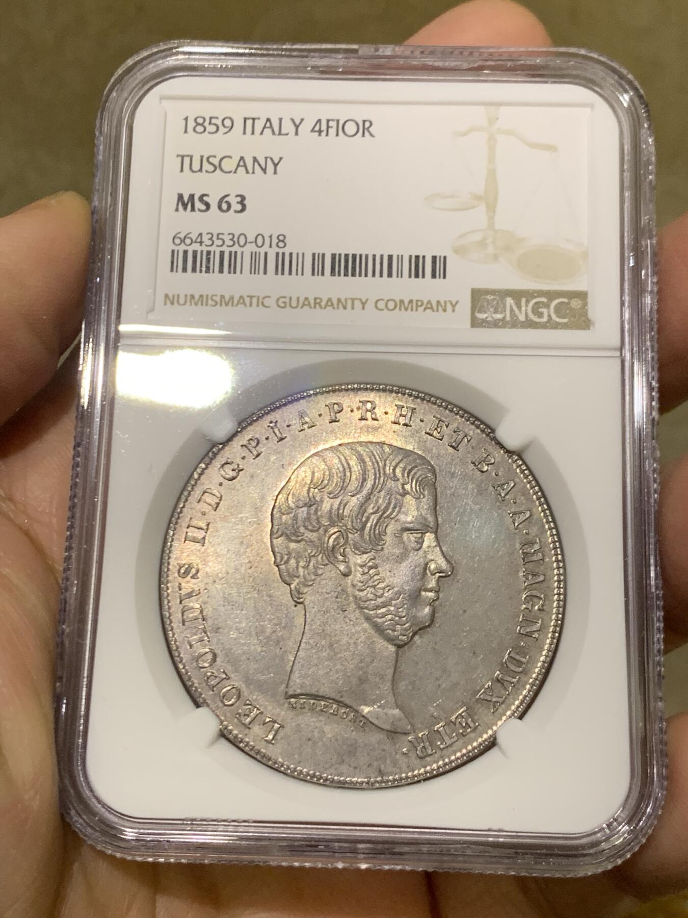 《竞宝斋》第454场 周日，周一 2场连拍 （全场包邮，欢迎送拍） NGC MS63 意大利1859年托斯卡纳大公国4菲奥里尼大银币，正面为老年版的利奥波德二世，背面为精美的奥地利意大利混合盾徽。出厂银光状态，极为难得的是币本身未见铸缺和矫正痕，转光状态。63中的佼佼者，同时也是托斯卡纳地区最后的主币年份，不可多得。
