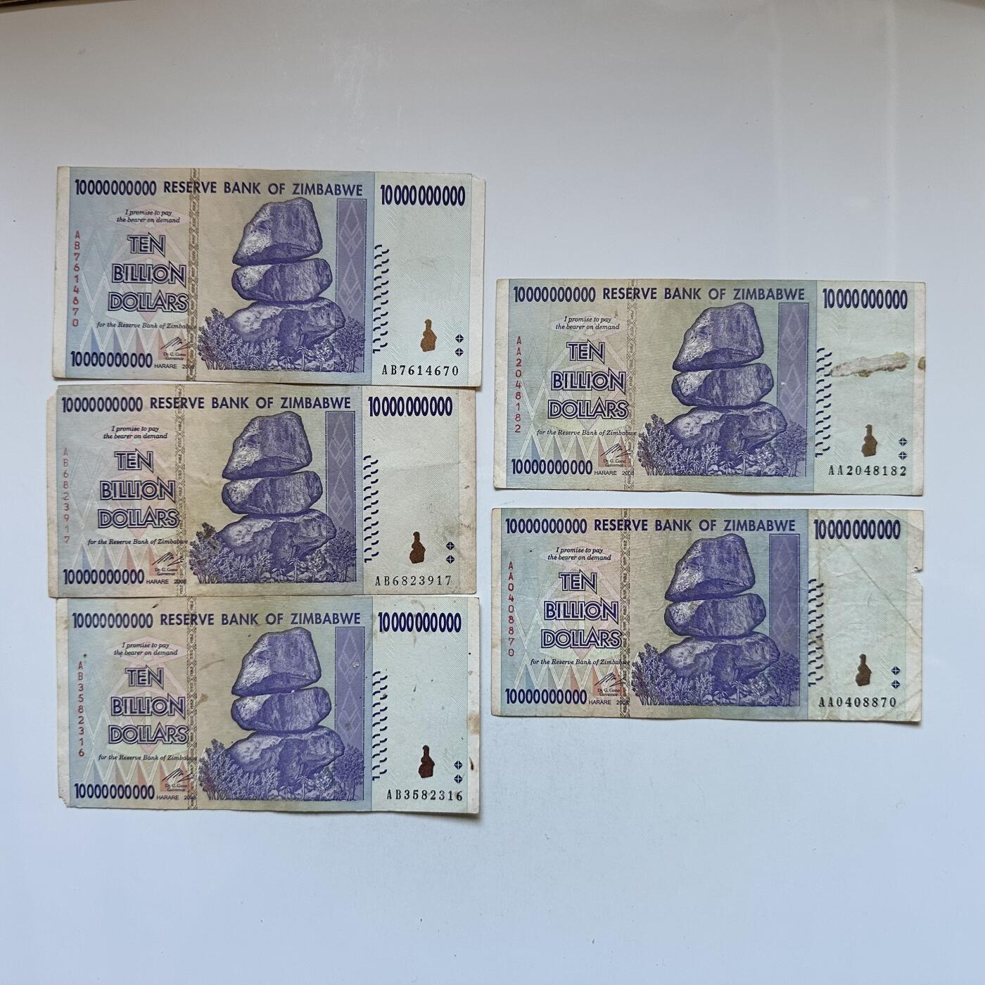 🌹外币初藏🌹🐯2026年第3场  每周二四六晚8️⃣点 接代拍 津巴布韦100亿纸币5张 10个0 边角有缺—1