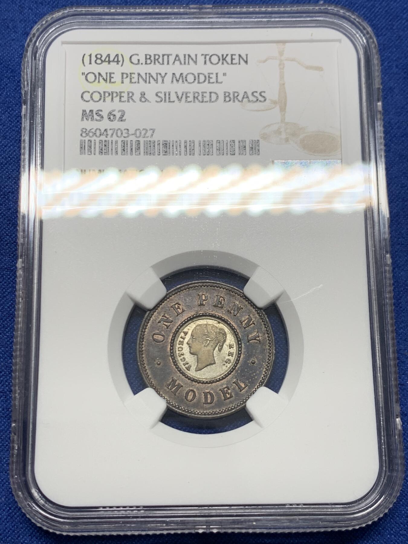 《竞宝斋》第454场 周日，周一 2场连拍 （全场包邮，欢迎送拍） NGC MS62英国（1844年）一便士双色代币 内圈为镀银版本 比较少见