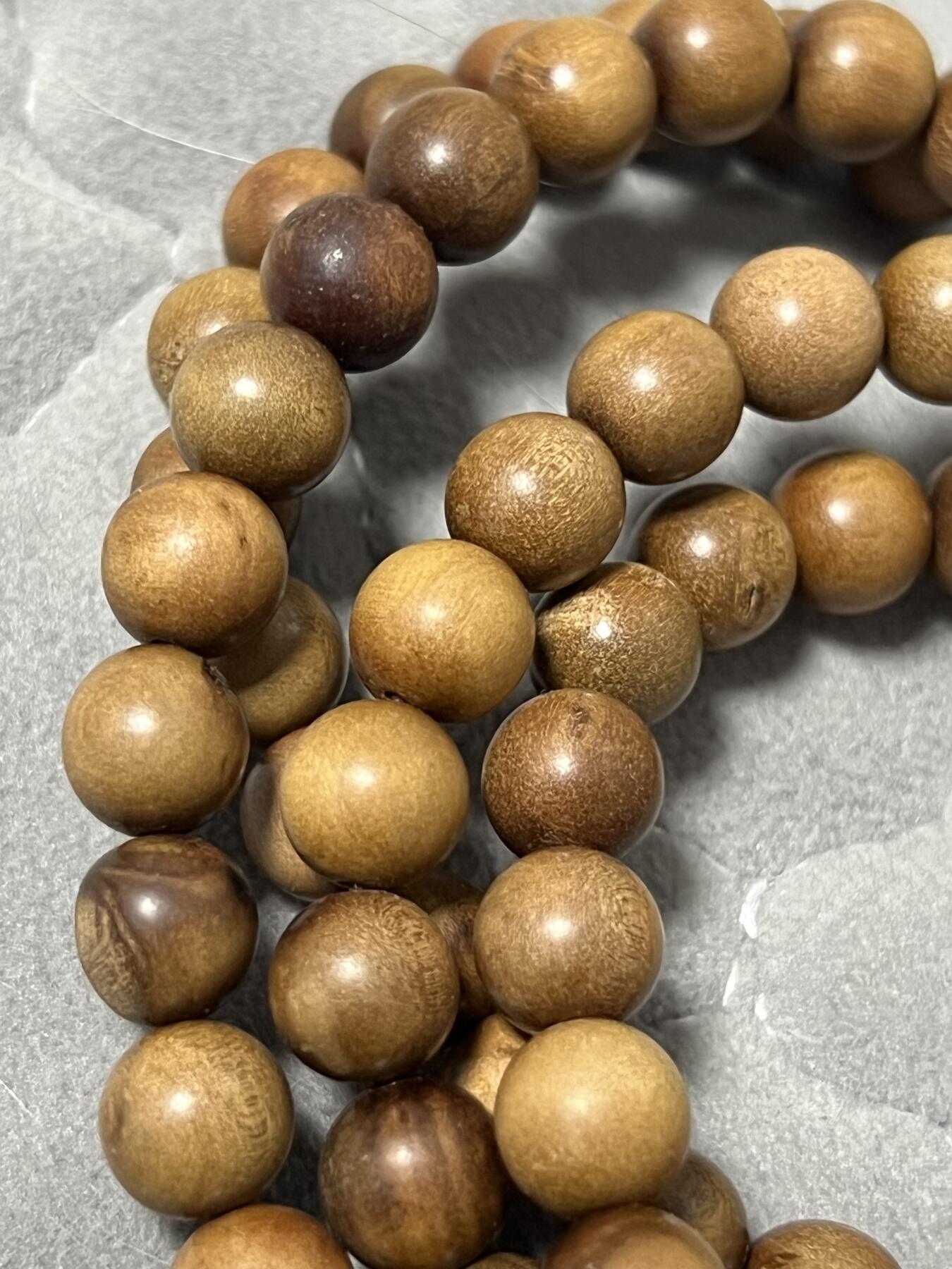 零元拍：正区印度老山檀 108/0.8长串 有珠子有裂带留疤 ，不影响品香