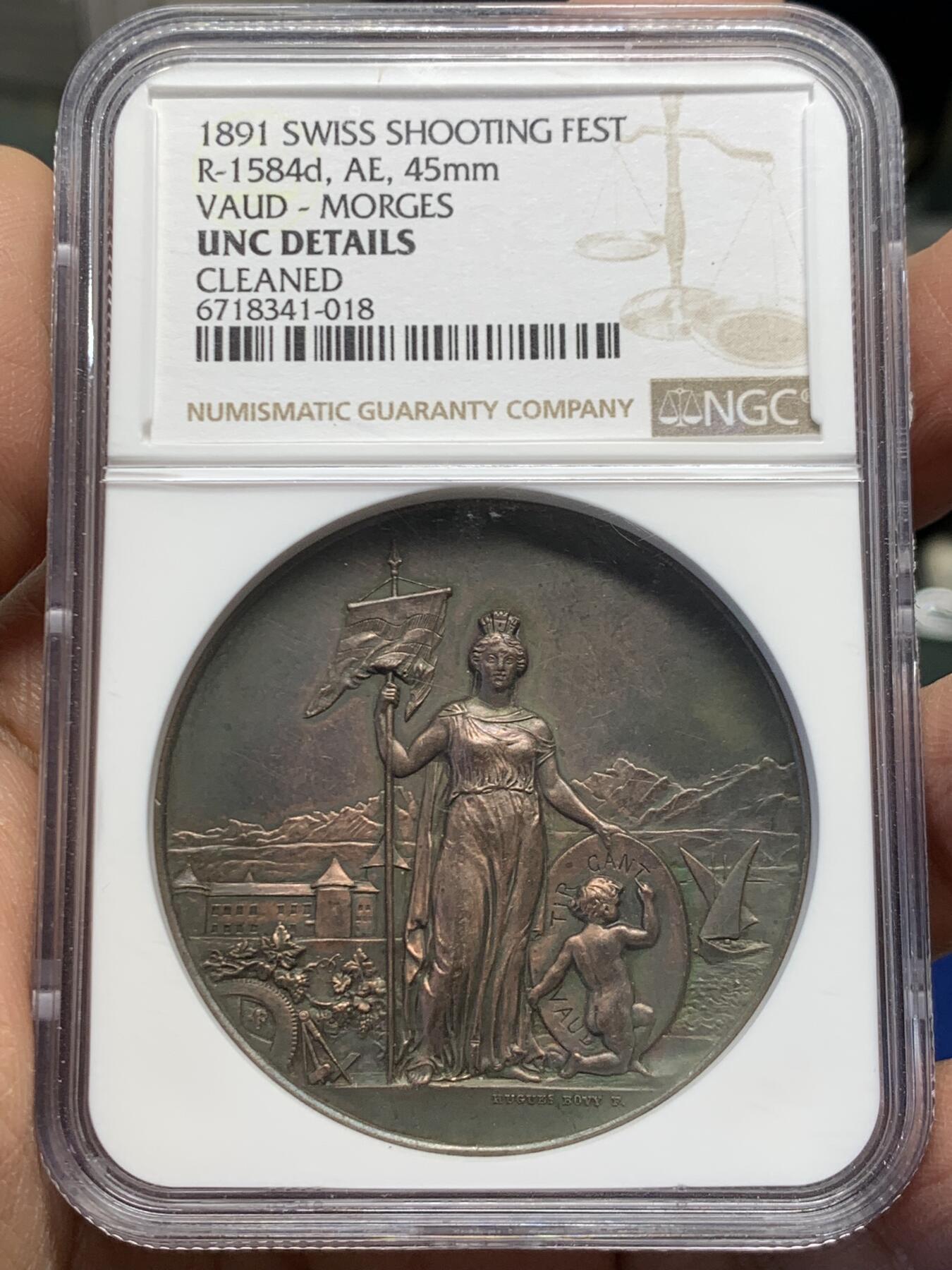 《竞宝斋》第454场 周日，周一 2场连拍 （全场包邮，欢迎送拍） NGC UNC 瑞士1891沃州射击节铜章 巧克力色 人物生动 细节保存非常好 加厚盒装