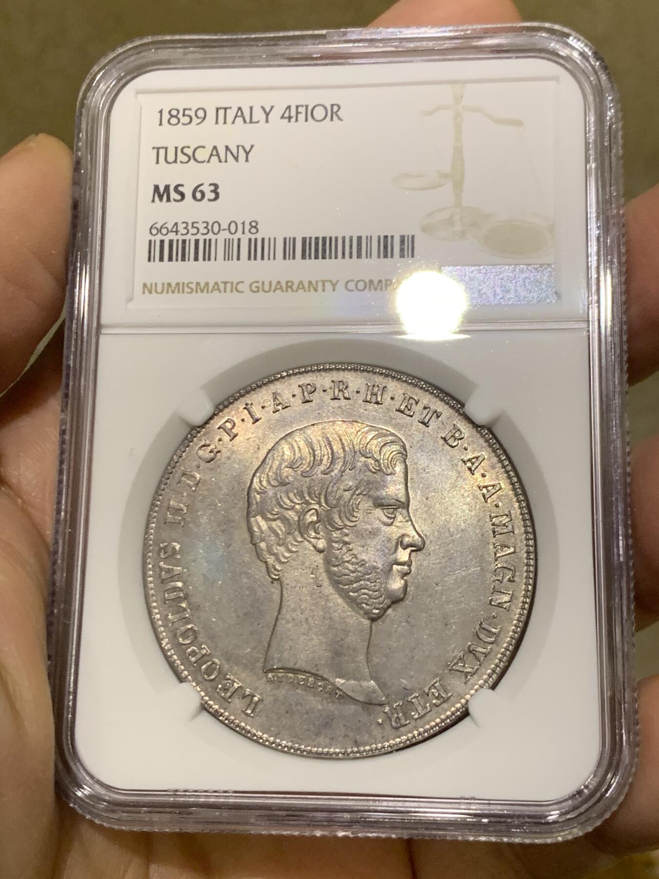 《竞宝斋》第454场 周日，周一 2场连拍 （全场包邮，欢迎送拍） NGC MS63 意大利1859年托斯卡纳大公国4菲奥里尼大银币，正面为老年版的利奥波德二世，背面为精美的奥地利意大利混合盾徽。出厂银光状态，极为难得的是币本身未见铸缺和矫正痕，转光状态。63中的佼佼者，同时也是托斯卡纳地区最后的主币年份，不可多得。